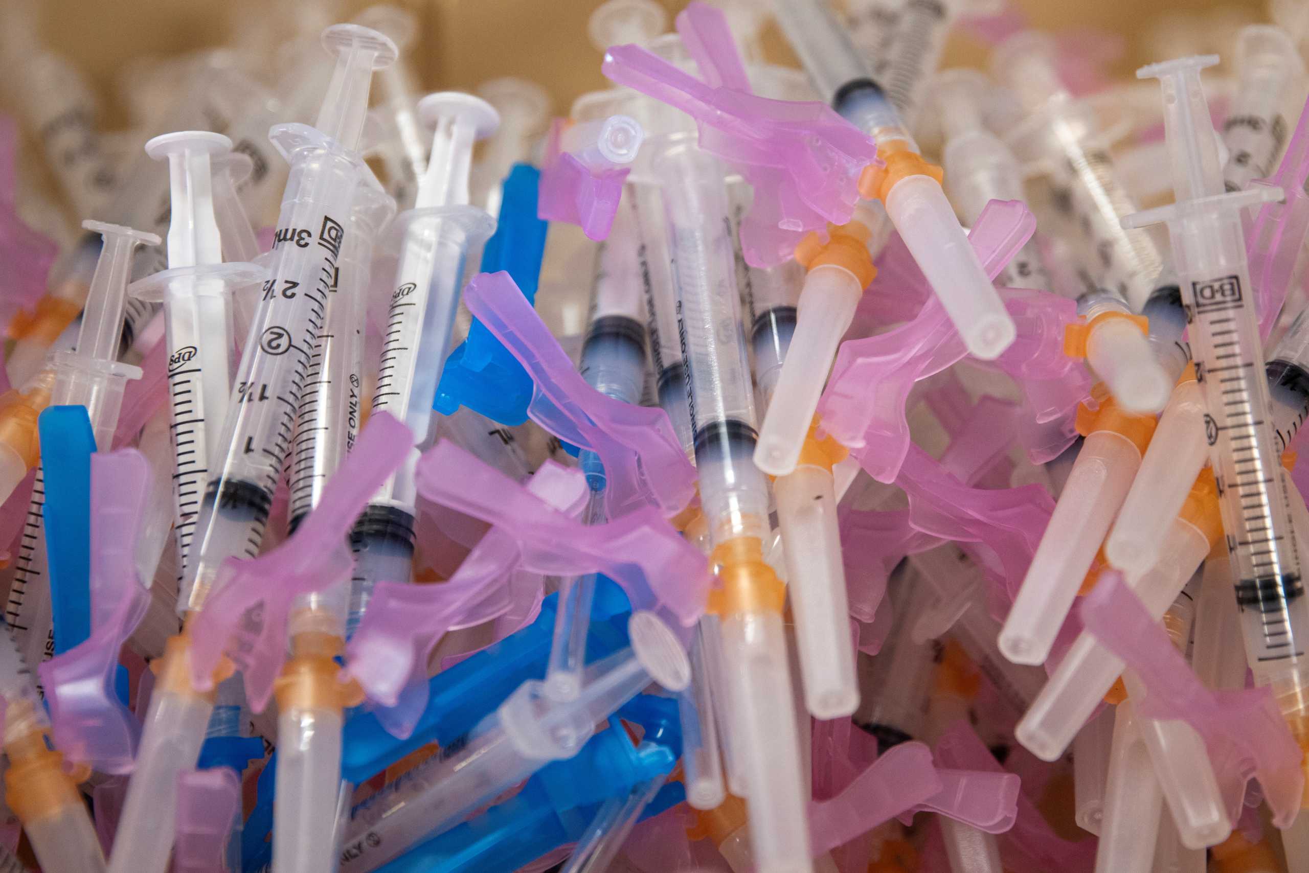 FILE PHOTO: Syringes filled with the Moderna vaccine await patients at a vaccination super station setup in an empty department store during the outbreak of the coronavirus disease (COVID-19) in Chula Vista, California, U.S., January 21, 2021. REUTERS
