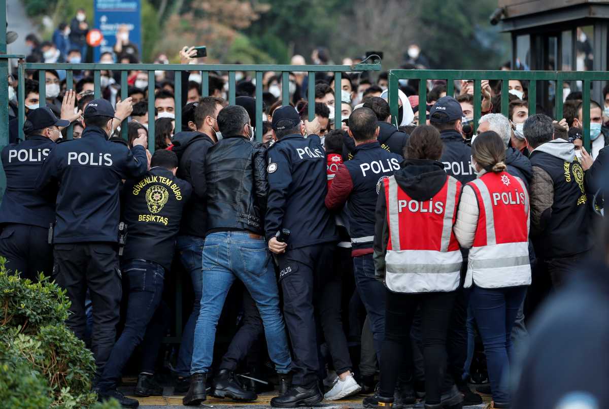 Turkish riot police blocks the main gate of Bogazici University to prevent students from leaving the campus as they protest against President Tayyip Erdogan's appointment of a new rector in Istanbul Turkey January 4, 2021. REUTERS