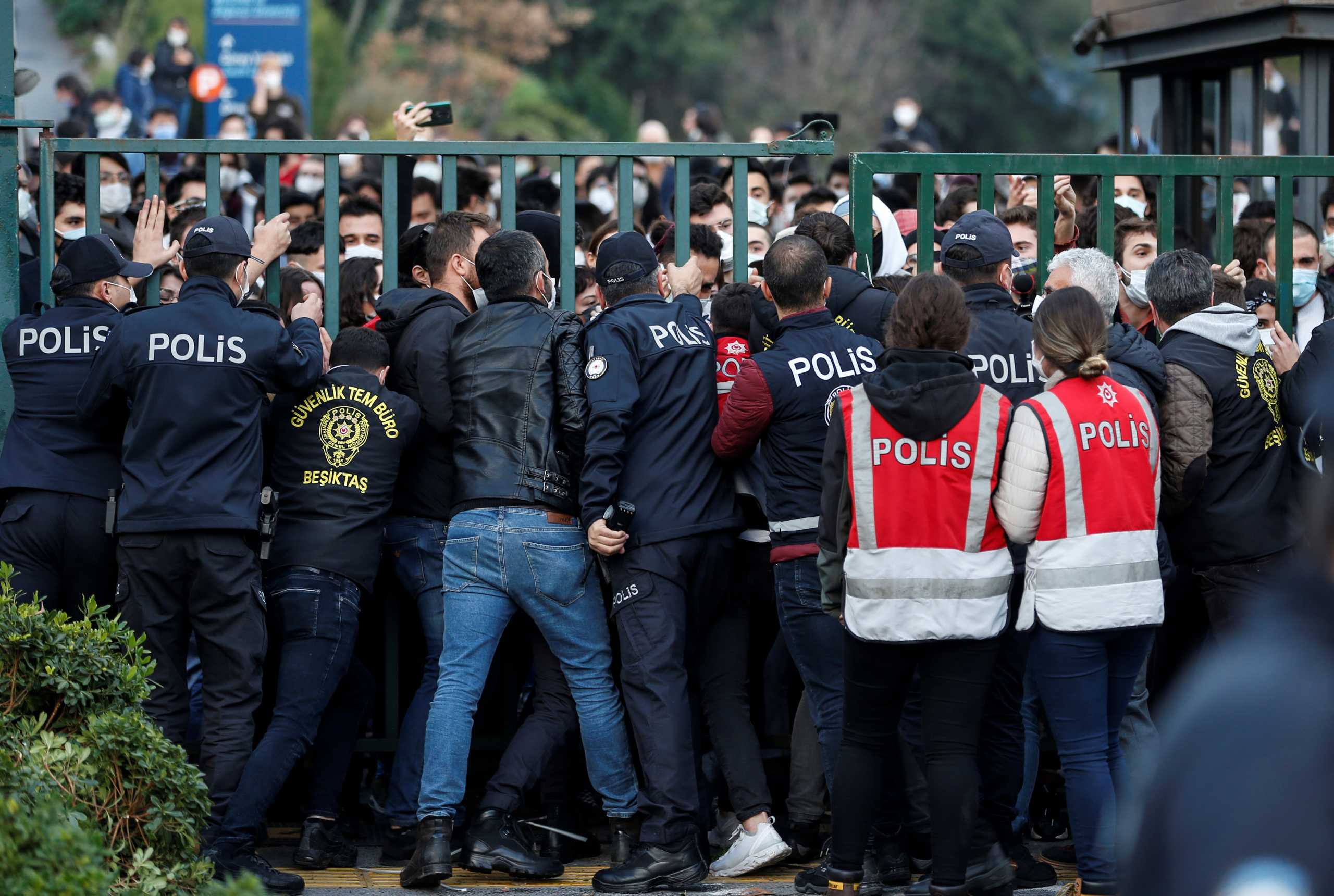 Turkish riot police blocks the main gate of Bogazici University to prevent students from leaving the campus as they protest against President Tayyip Erdogan's appointment of a new rector in Istanbul Turkey January 4, 2021. REUTERS