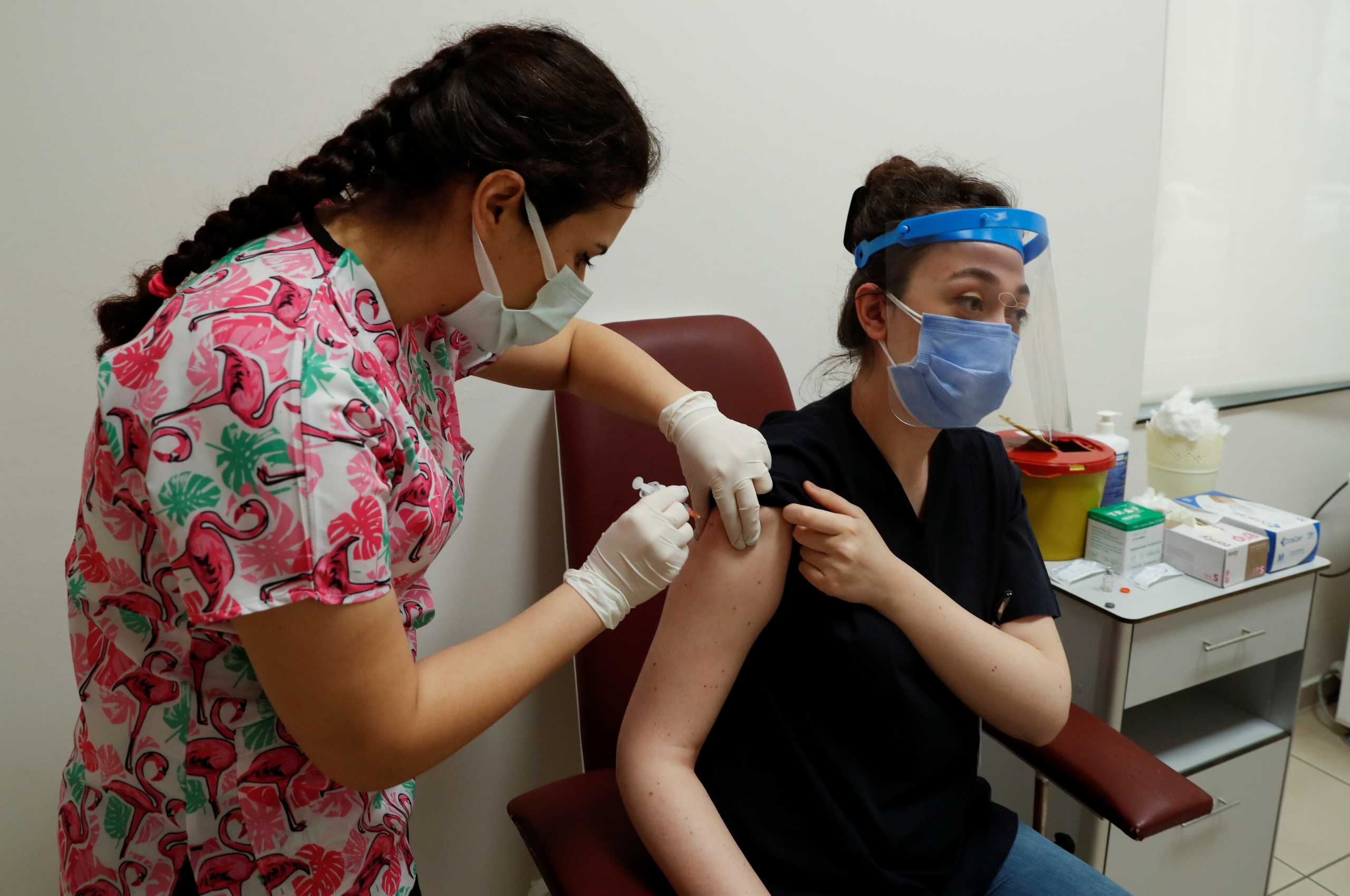 Doctor Ayse Kosereisoglu receives a shot of the Sinovac's CoronaVac COVID-19 vaccine at the Sancaktepe Sehit Dr. Ilhan Varank Training and Research Hospital, in Istanbul, Turkey January 14, 2021. REUTERS