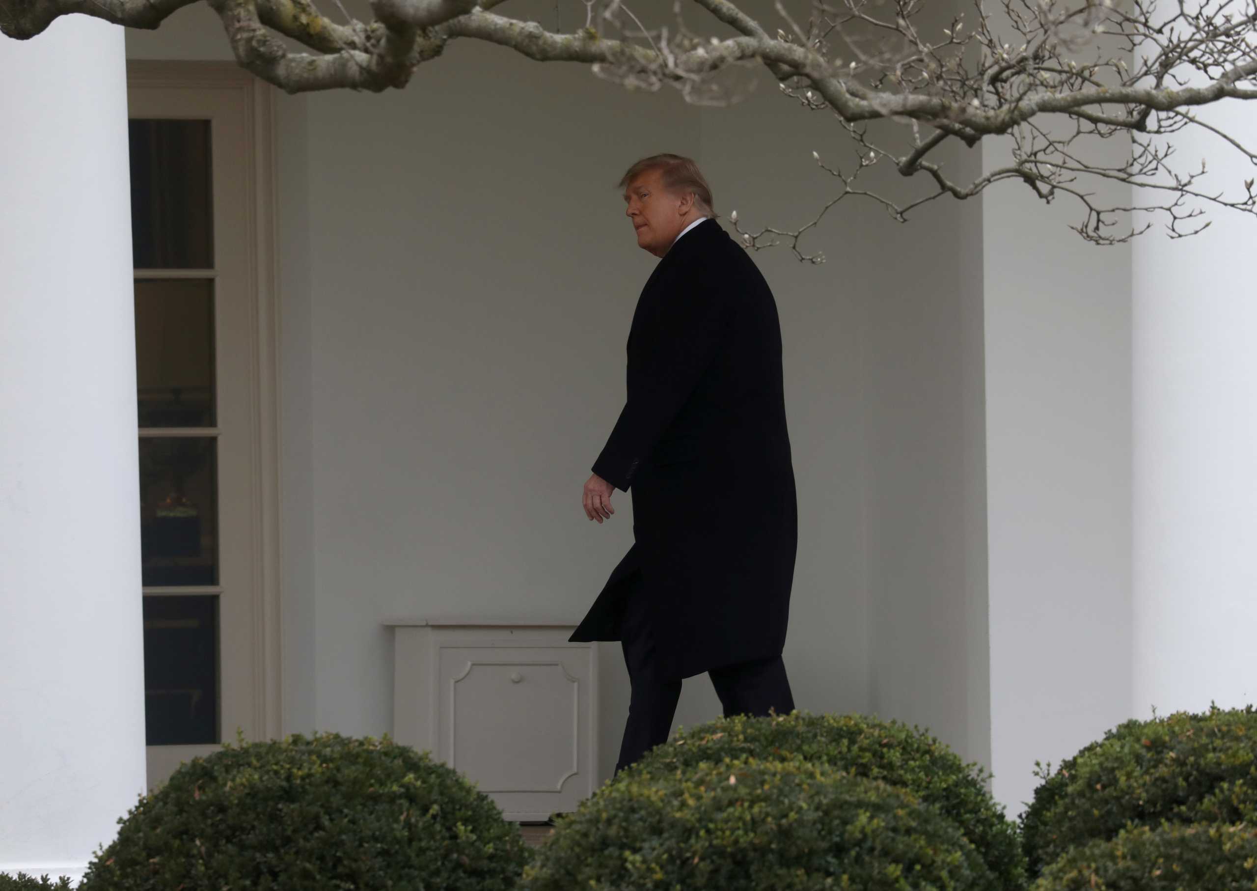 U.S. President Donald Trump walks to the Oval Office after returning from Mar-A-Lago to the White House in Washington, U.S., December 31, 2020. REUTERS