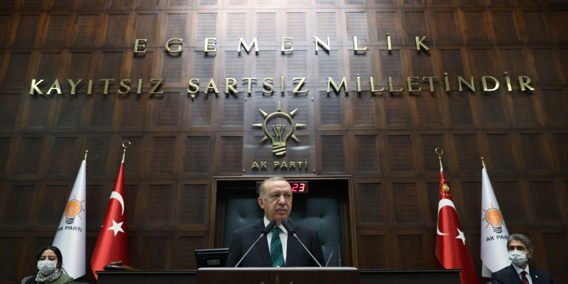 Turkish President Tayyip Erdogan addresses members of parliament from his ruling AK Party (AKP) during a meeting at the Turkish parliament in Ankara, Turkey, February 10, 2021. Murat Cetinmuhurdar