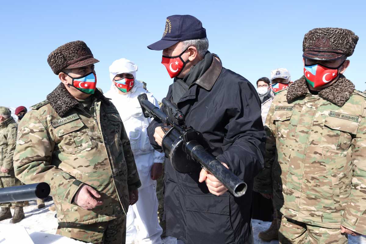 Turkish Defense Minister Hulusi Akar and his Azeri counterpart Zakir Hasanov inspect troops during Turkish-Azeri joint military exercises in the eastern Kars province, Turkey February 11, 2021. Arif Akdogan