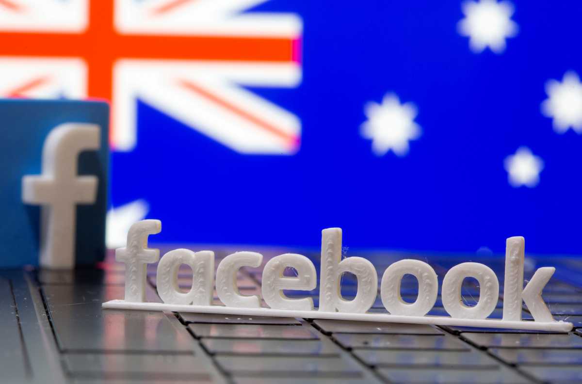FILE PHOTO: A 3D printed Facebook logo is seen in front of displayed Australia's flag in this illustration photo taken February 18, 2021. REUTERS