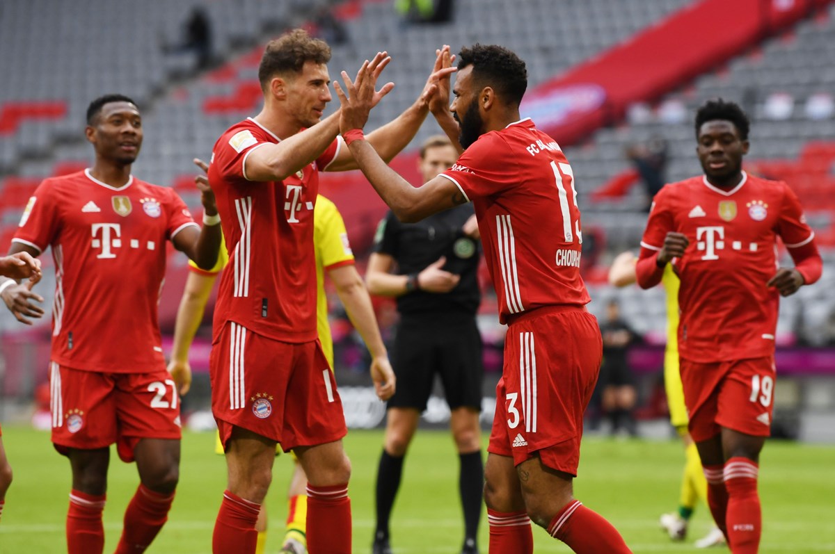 Soccer Football - Bundesliga - Bayern Munich v FC Cologne - Allianz Arena, Munich, Germany - February 27, 2021 Bayern Munich's Eric Maxim Choupo-Moting celebrates scoring their first goal with teammates REUTERS