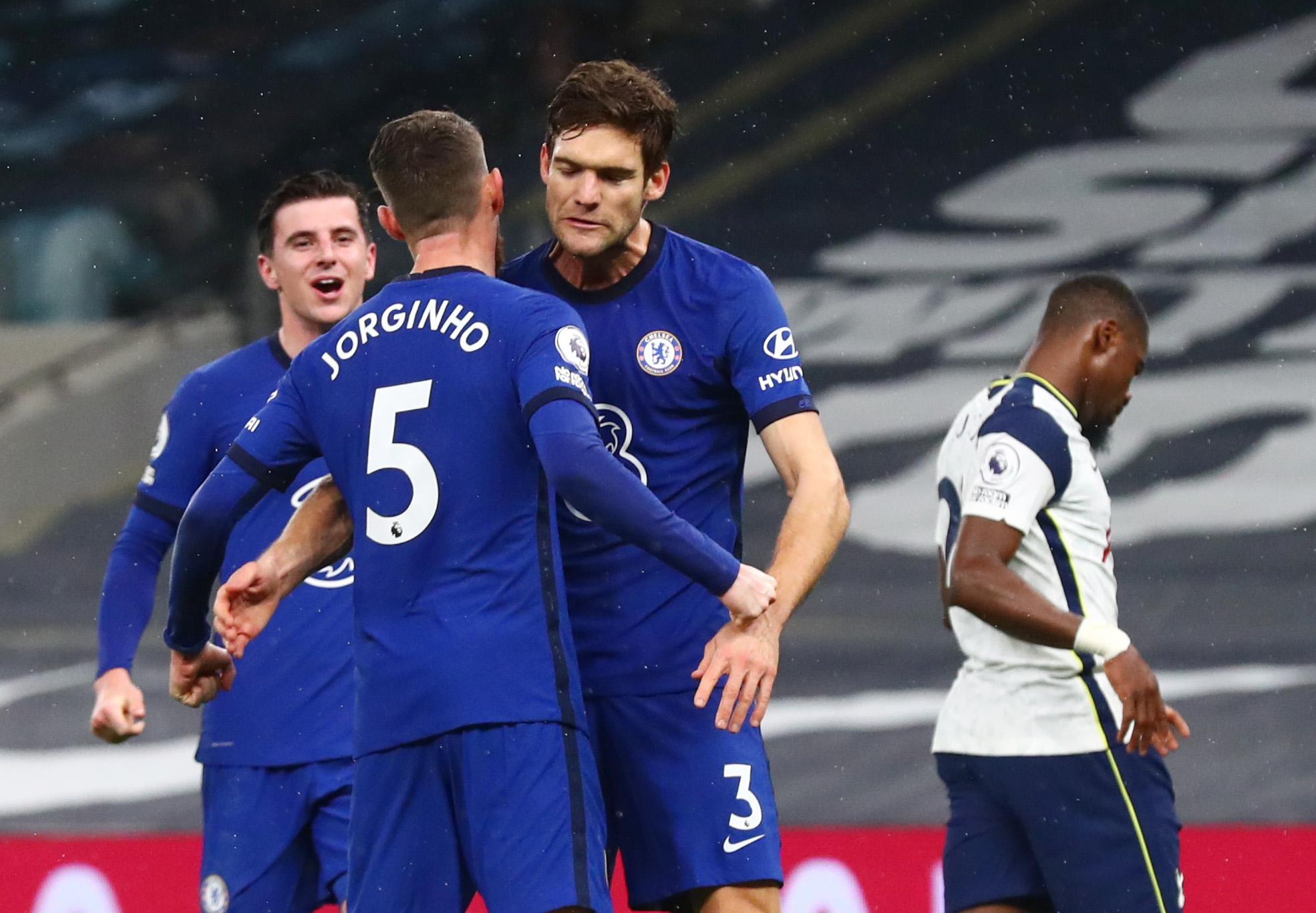 Soccer Football - Premier League - Tottenham Hotspur v Chelsea - Tottenham Hotspur Stadium, London, Britain - February 4, 2021 Chelsea's Jorginho celebrates scoring their first goal with Marcos Alonso REUTERS