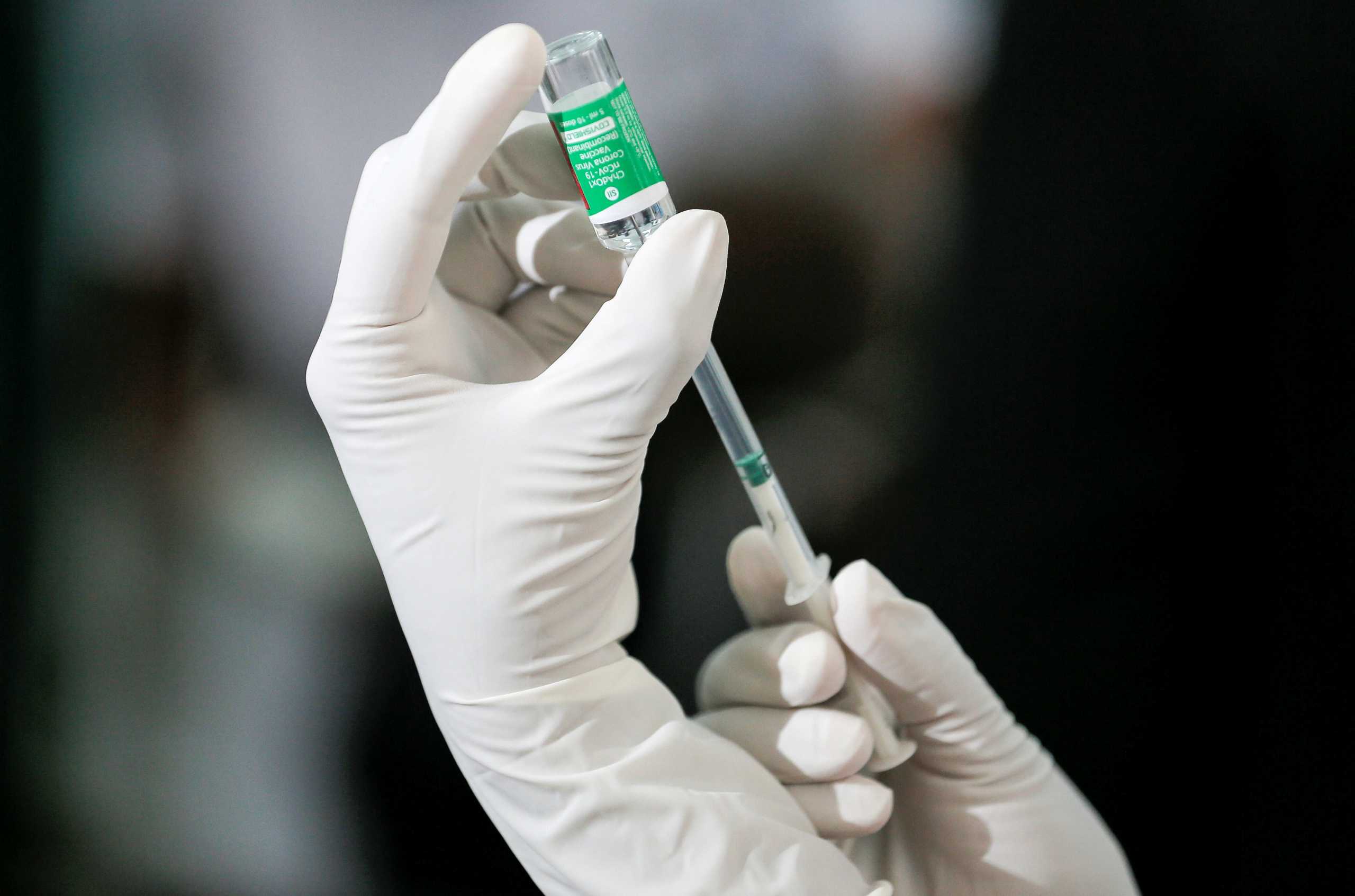 FILE PHOTO: A health official draws a dose of the AstraZeneca's COVID-19 vaccine manufactured by the Serum Institute of India, at Infectious Diseases Hospital in Colombo, Sri Lanka January 29, 2021. REUTERS
