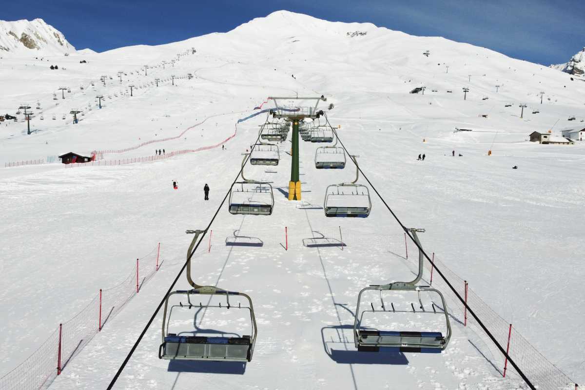Closed ski lifts are pictured, as the government signed a last minute order to keep ski resorts closed until March, in Ponte di Legno, Italy, February 15, 2021. Picture taken with a drone. REUTERS