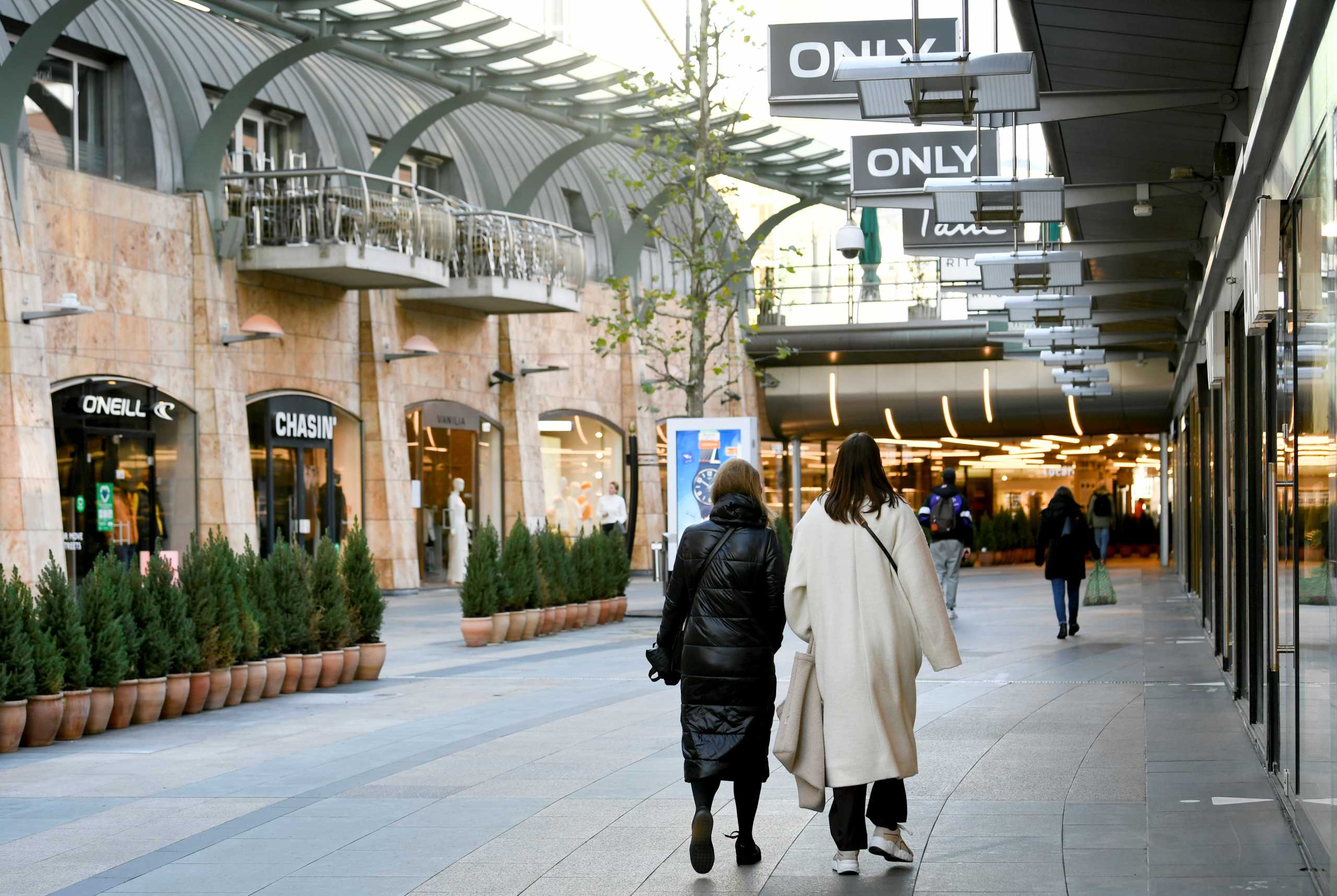 People walk an empty shopping street as Netherlands is set to extend the lockdown as the spread of the coronavirus disease (COVID-19) continues in Rotterdam, Netherlands January 12 2021, REUTERS