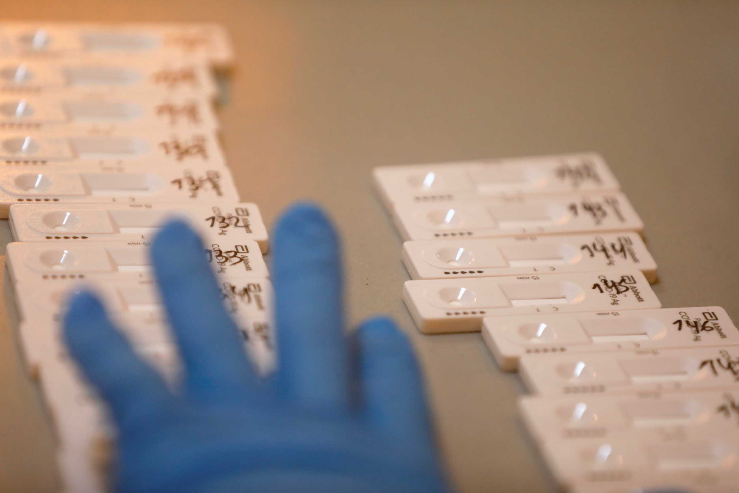 Rapid detection testing kits are seen on a table during massive free testing for the coronavirus disease (COVID-19) conducted by the Spanish Red Cross, in Alcobendas, outside Madrid, Spain January 29, 2021. REUTERS