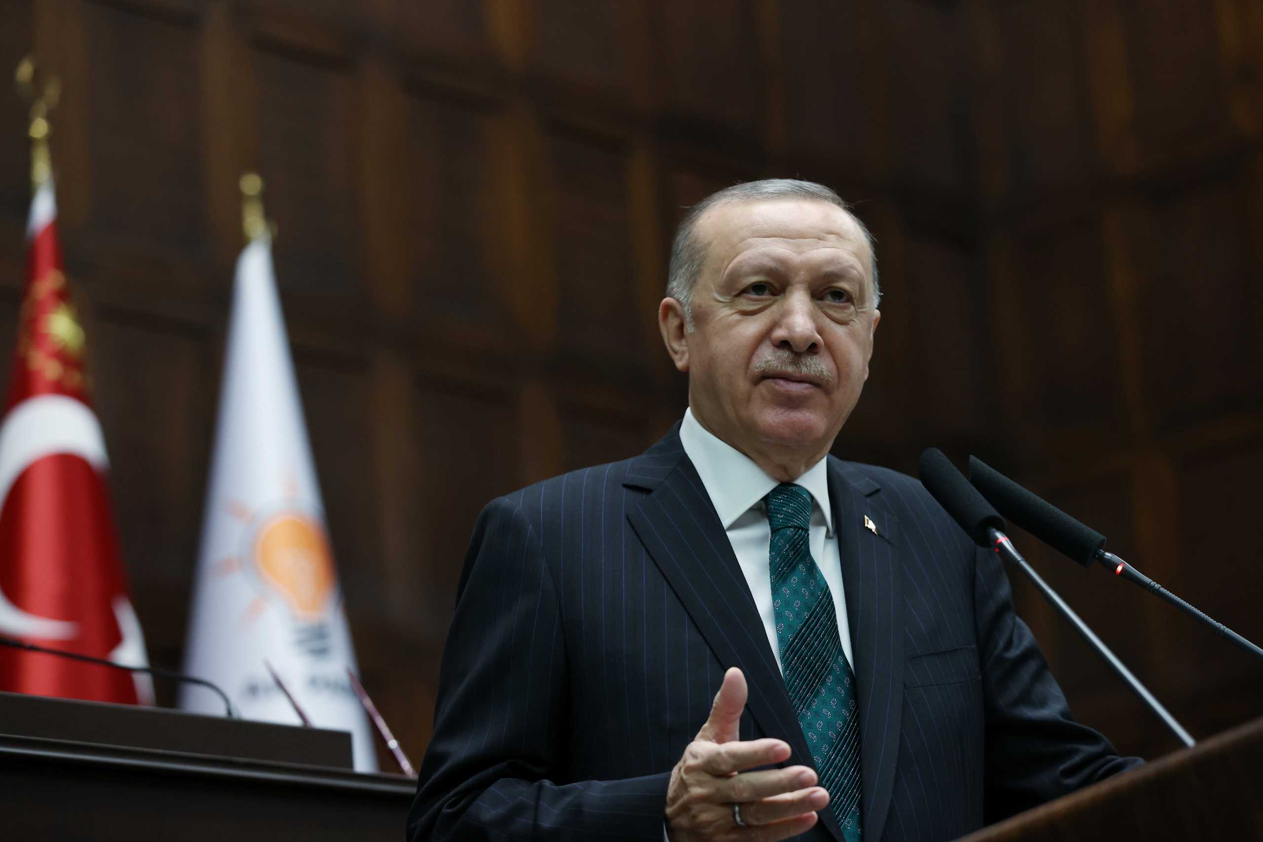 Turkish President Tayyip Erdogan addresses members of parliament from his ruling AK Party (AKP) during a meeting at the Turkish parliament in Ankara, Turkey, February 10, 2021. Murat Cetinmuhurdar