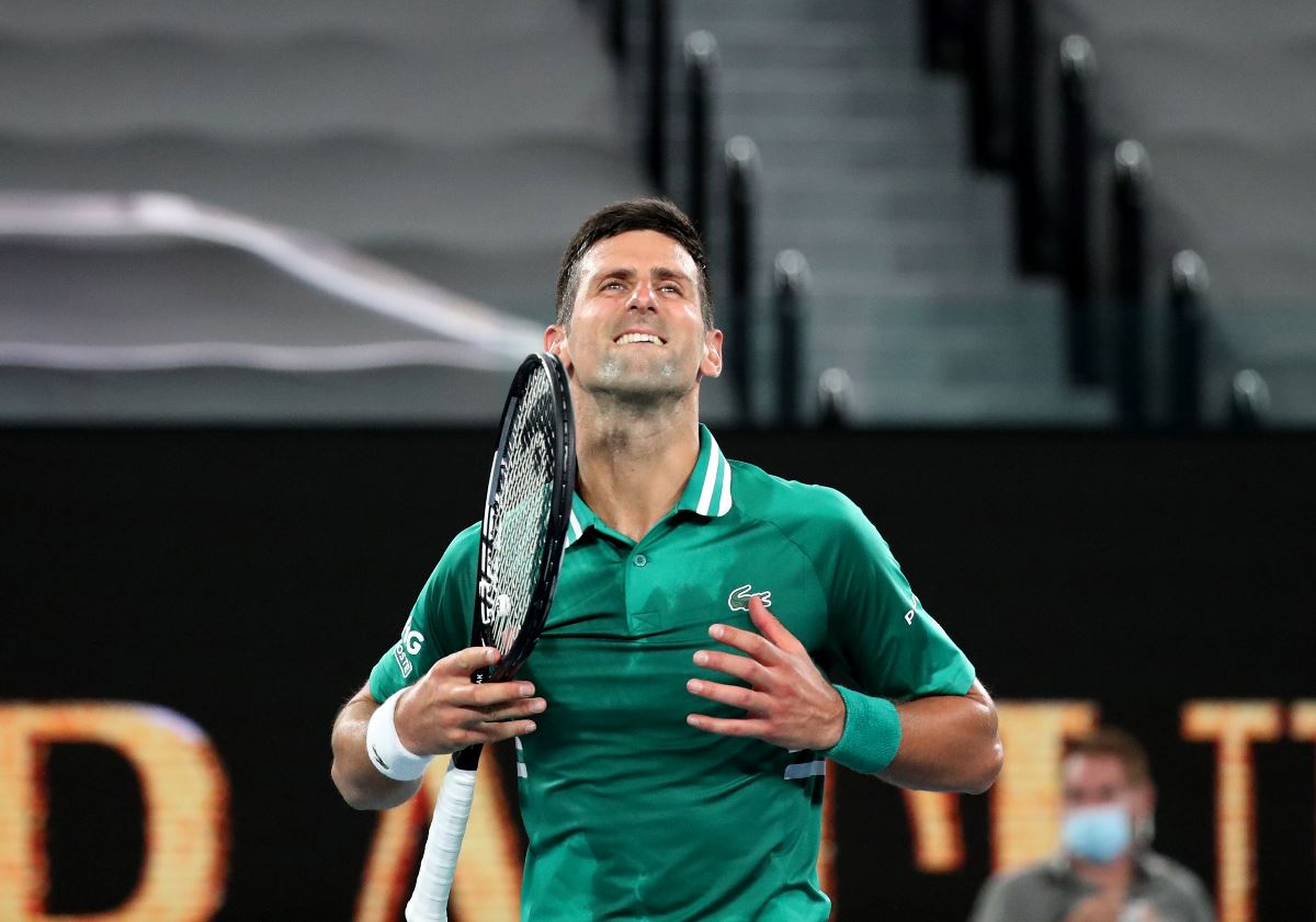 Tennis - Australian Open - Melbourne Park, Melbourne, Australia, February 17, 2021 Serbia's Novak Djokovic celebrates after winning his quarter final match against Germany's Alexander Zverev REUTERS