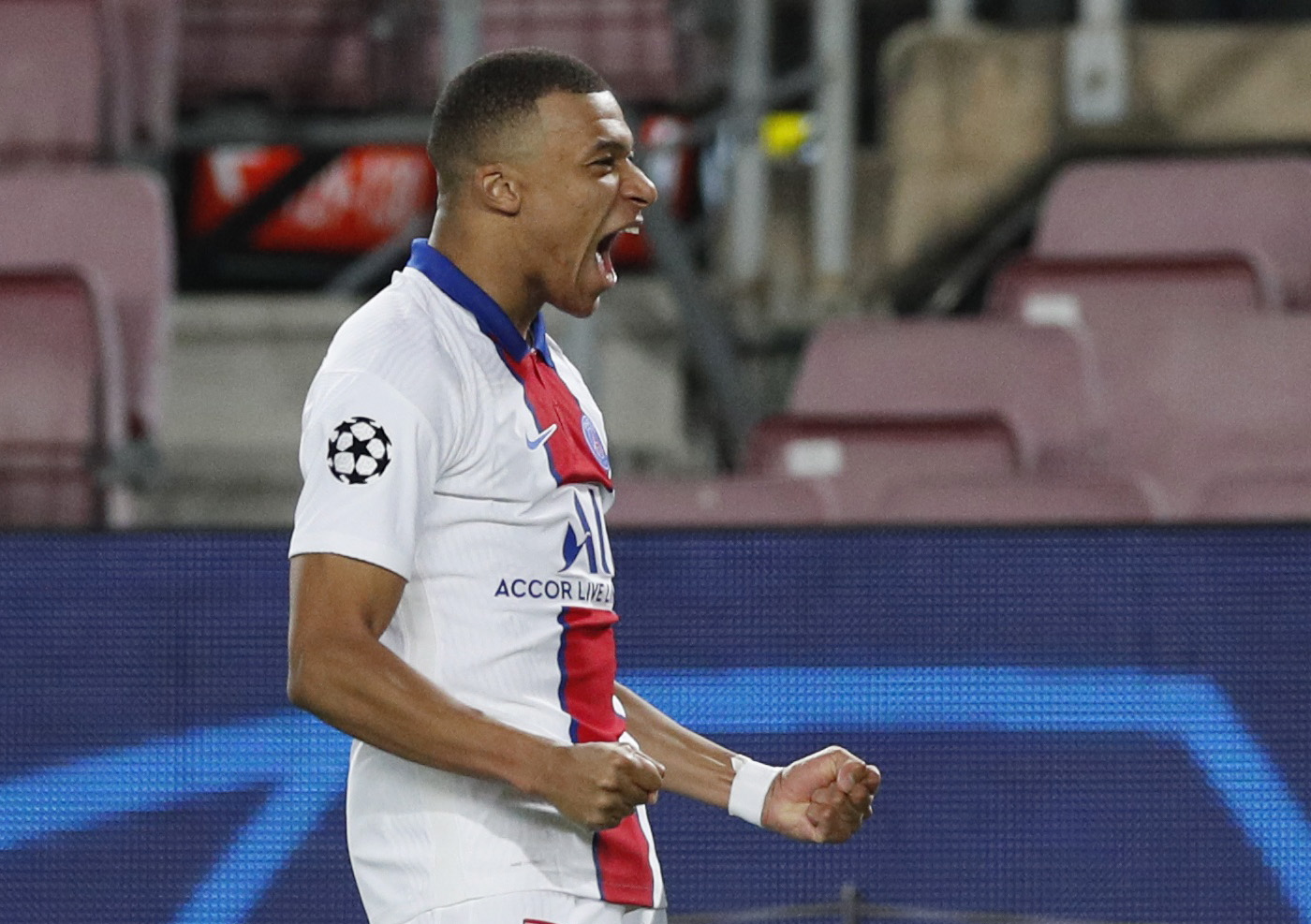 Soccer Football - Champions League - Round of 16 First Leg - FC Barcelona v Paris St Germain - Camp Nou, Barcelona, Spain - February 16, 2021 Paris St Germain's Kylian Mbappe celebrates scoring their second goal REUTERS
