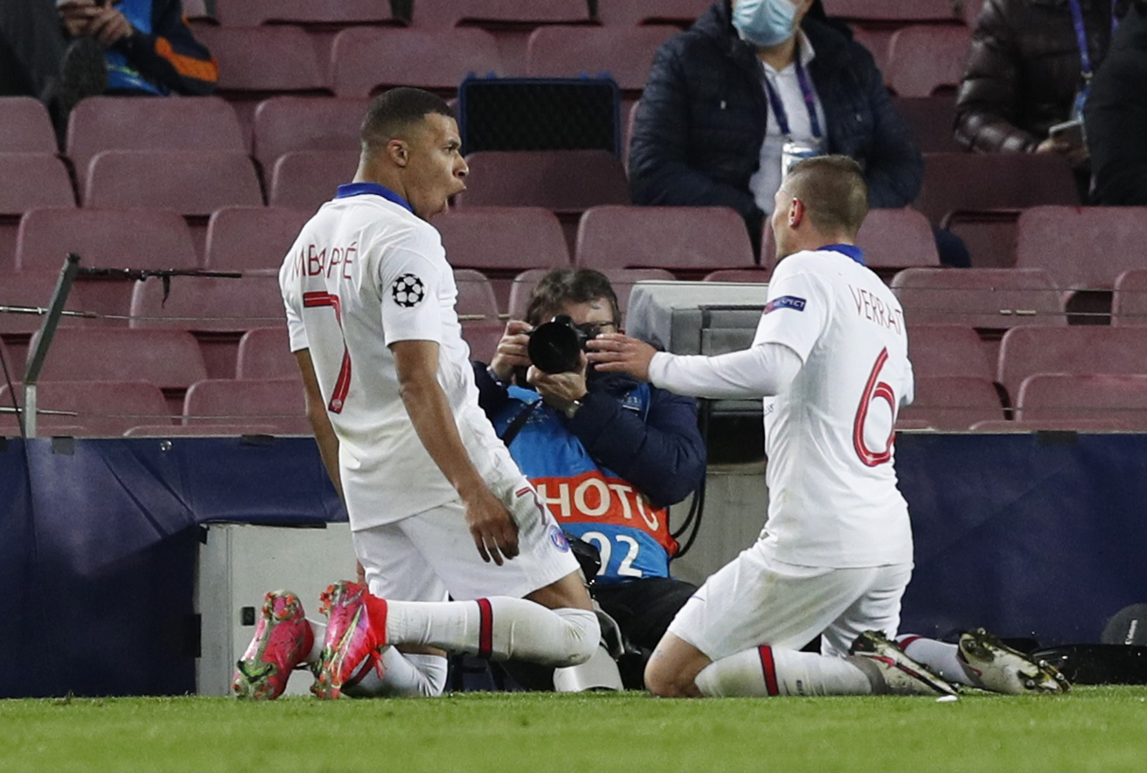 Soccer Football - Champions League - Round of 16 First Leg - FC Barcelona v Paris St Germain - Camp Nou, Barcelona, Spain - February 16, 2021  Paris St Germain's Kylian Mbappe celebrates scoring their first goal REUTERS