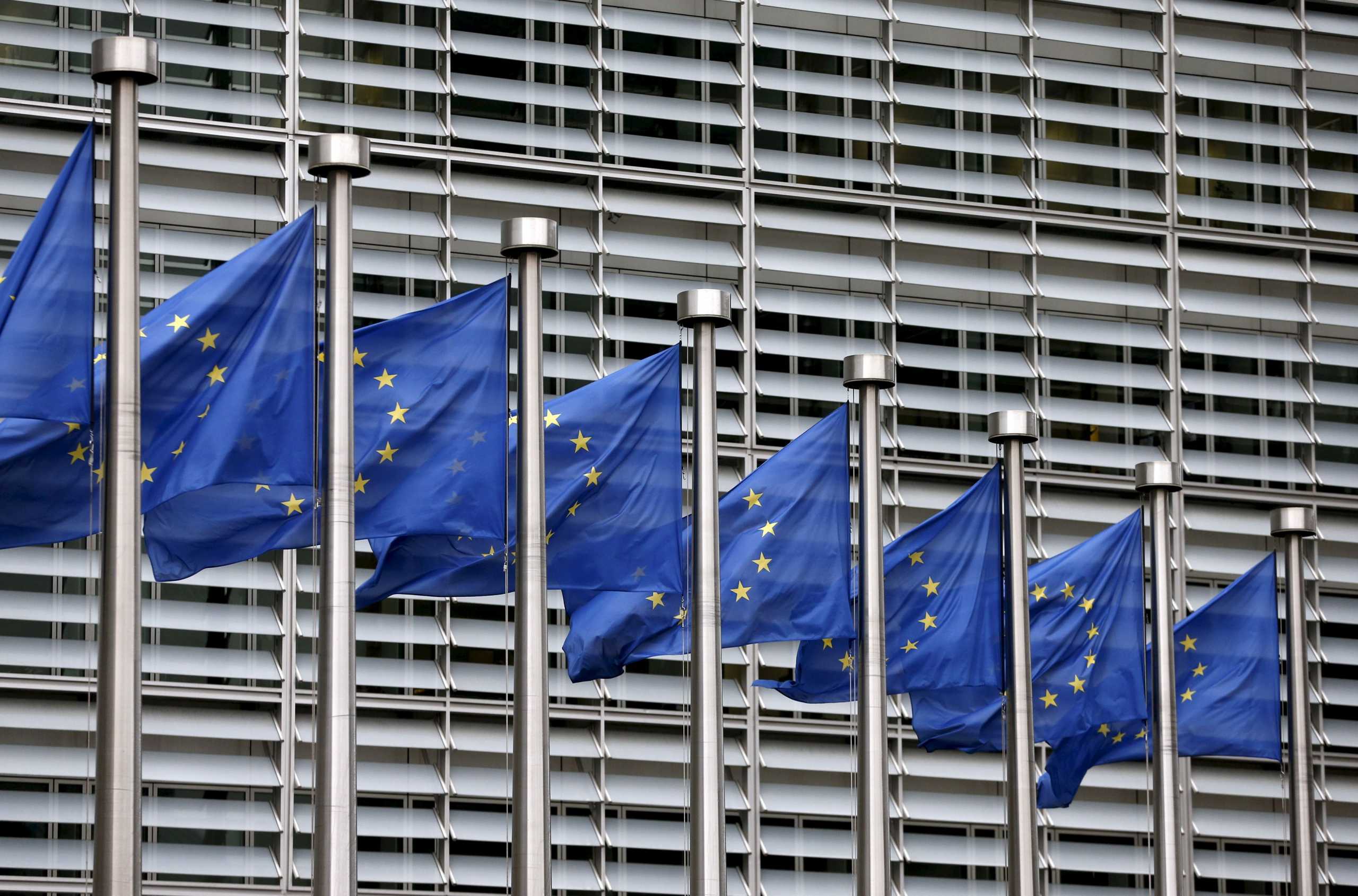 FILE PHOTO: European Union flags flutter outside the EU Commission headquarters in Brussels, Belgium, in this file picture taken October 28, 2015. REUTERS