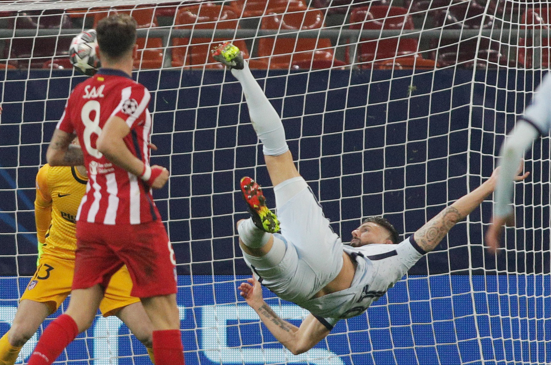 Soccer Football - Champions League - Round of 16 First Leg - Atletico Madrid v Chelsea - Arena Nationala, Bucharest, Romania - February 23, 2021 Chelsea's Olivier Giroud scores their first goal Inquam Photos via REUTERS