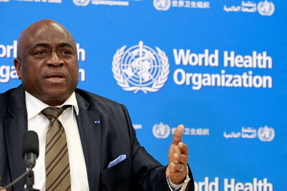 FILE PHOTO: Guinea's Minister of Health Remy Lamah speaks during a World Health Organization (WHO) virtual press conference following a  meeting on building resilient systems for health in Ebola-affected countries, in Geneva December 11, 2014. REUTERS