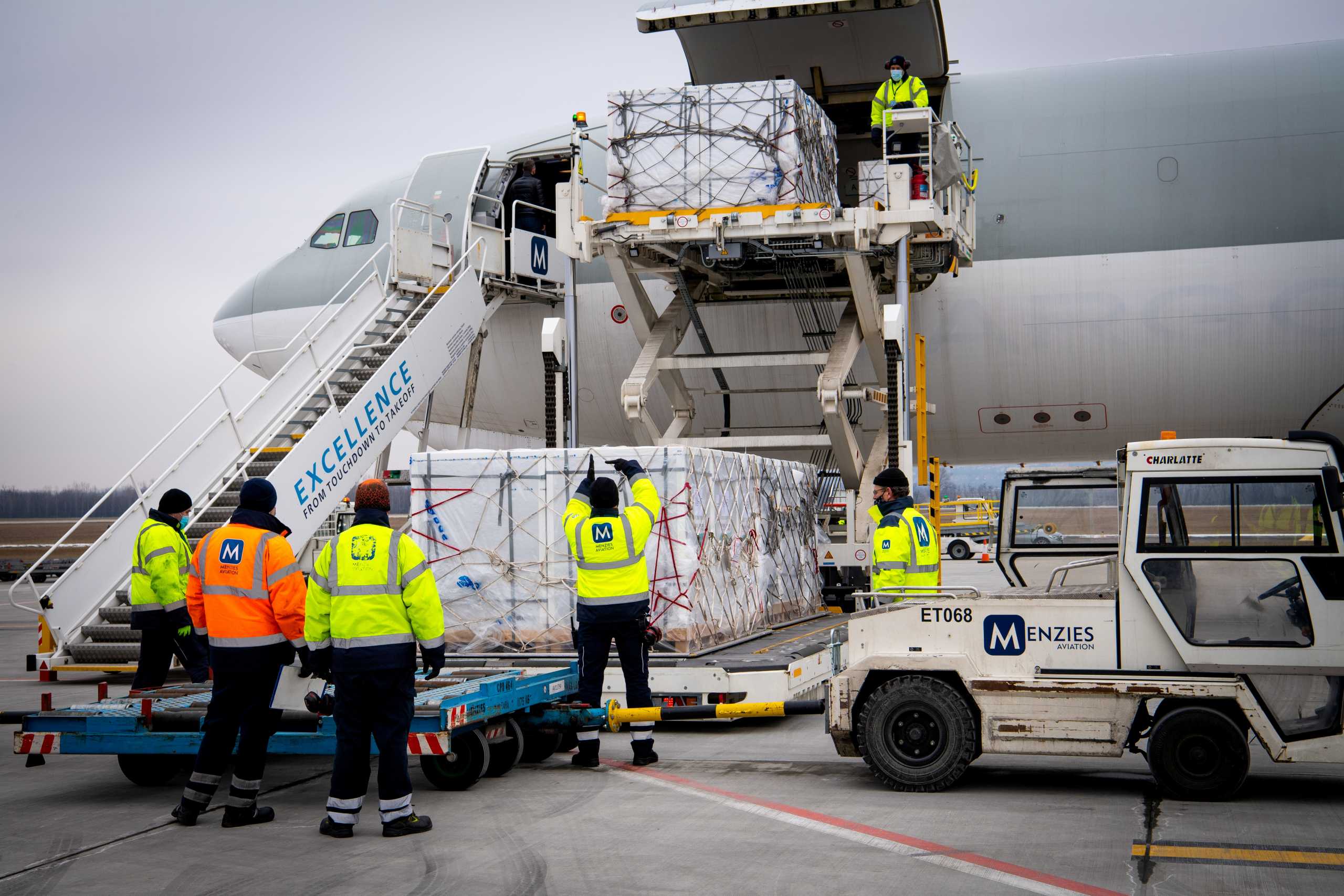 FILE PHOTO: Workers unload a shipment of Chinese company Sinopharm's coronavirus disease (COVID-19) vaccine as it arrives at Budapest Airport, Hungary, February 16, 2021. Ministry of Foreign Affairs and Trade (KKM)