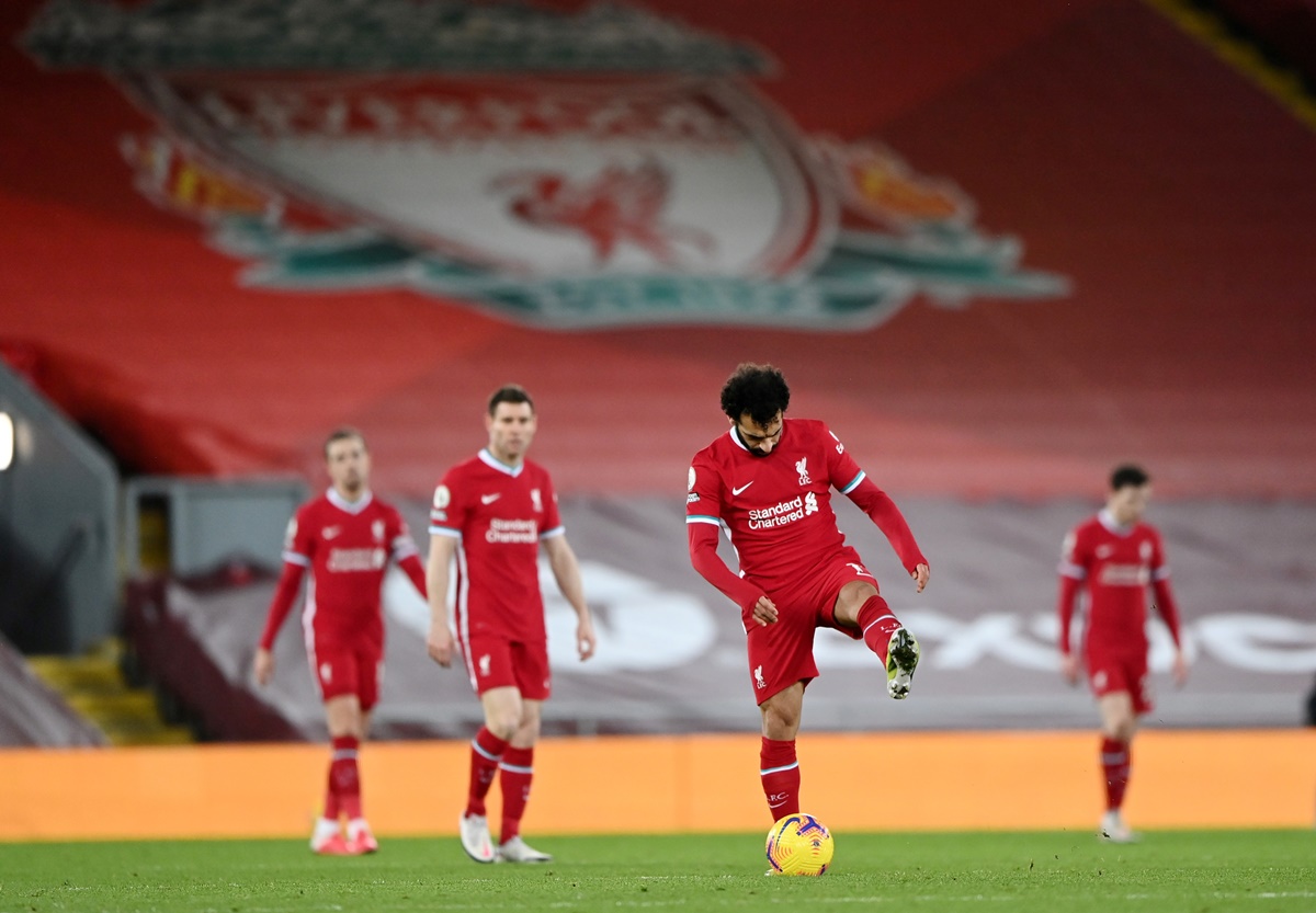 Soccer Football - Premier League - Liverpool v Manchester City - Anfield, Liverpool, Britain - February 7, 2021 Liverpool's Mohamed Salah looks dejected after Manchester City's second goal Pool via REUTERS