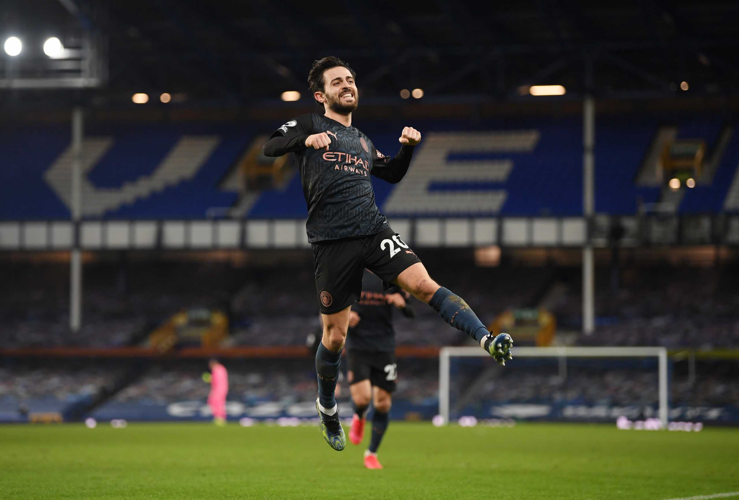 Soccer Football - Premier League - Everton v Manchester City - Goodison Park, Liverpool, Britain - February 17, 2021 Manchester City's Bernardo Silva celebrates scoring their third goal Pool via REUTERS