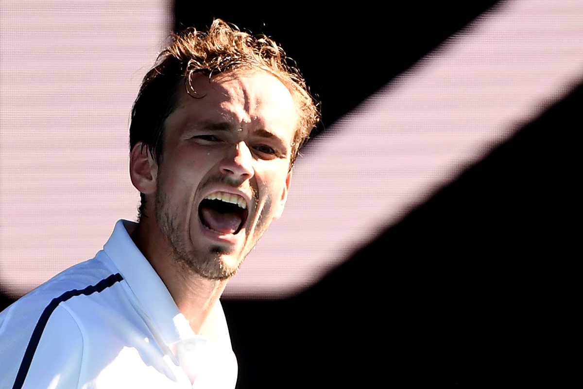 Tennis - Australian Open - Melbourne Park, Melbourne, Australia, February 17, 2021 Russia's Daniil Medvedev reacts during his quarter final match against Russia's Andrey Rublev REUTERS