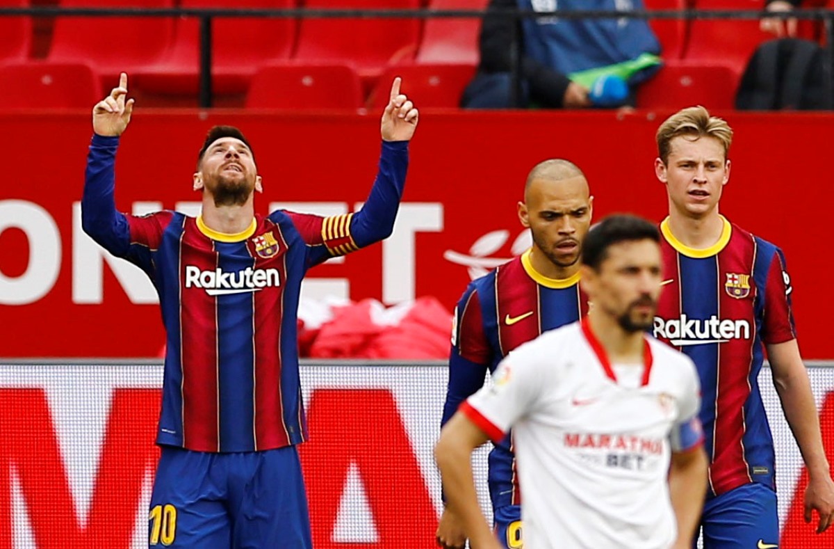 Soccer Football - La Liga Santander - Sevilla v FC Barcelona - Ramon Sanchez Pizjuan, Seville, Spain - February 27, 2021 Barcelona's Lionel Messi celebrates scoring their second goal REUTERS