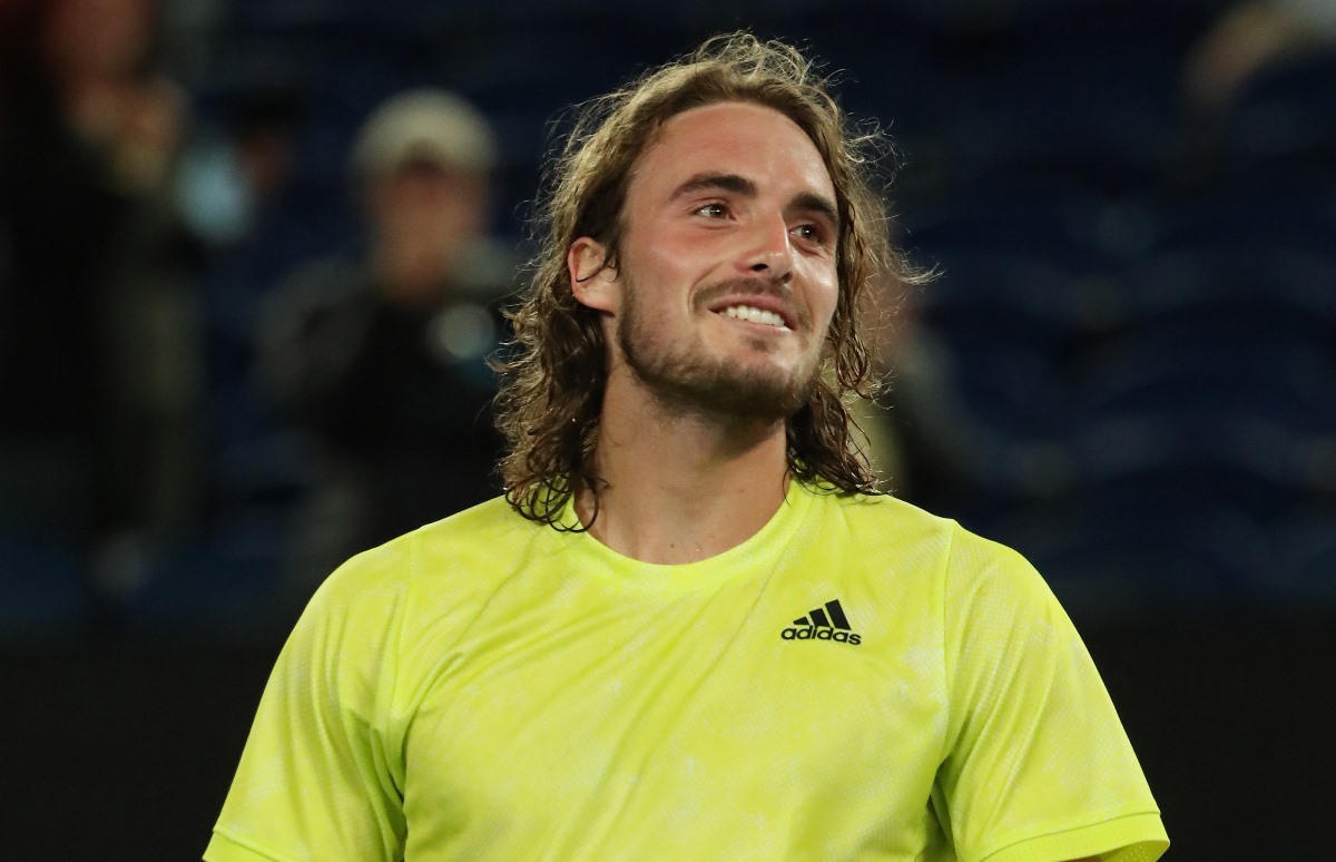 Tennis - Australian Open - Melbourne Park, Melbourne, Australia, February 9, 2021 Greece's Stefanos Tsitsipas celebrates winning his first round match against France's Gilles Simon REUTERS