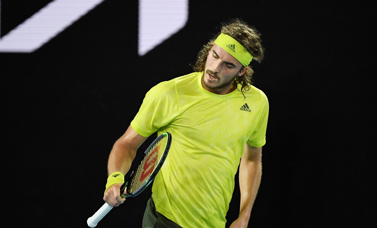 Tennis - Australian Open - Melbourne Park, Melbourne, Australia, February 17, 2021 Greece's Stefanos Tsitsipas celebrates winning the fourth set during his quarter final match against Spain's Rafael Nadal REUTERS