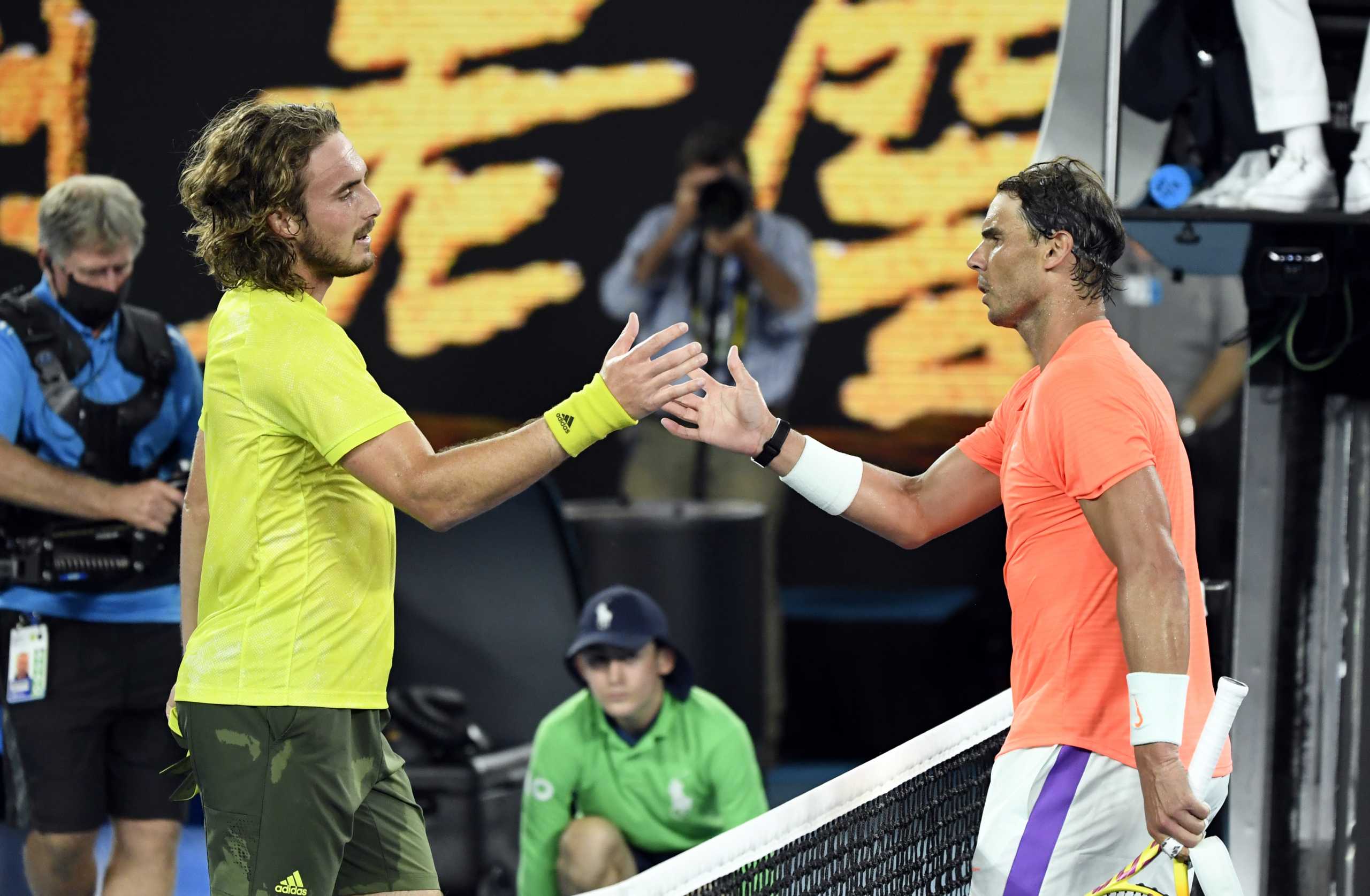 Tennis - Australian Open - Melbourne Park, Melbourne, Australia, February 17, 2021 Greece's Stefanos Tsitsipas shakes hands with Spain's Rafael Nadal after winning his quarter final match REUTERS