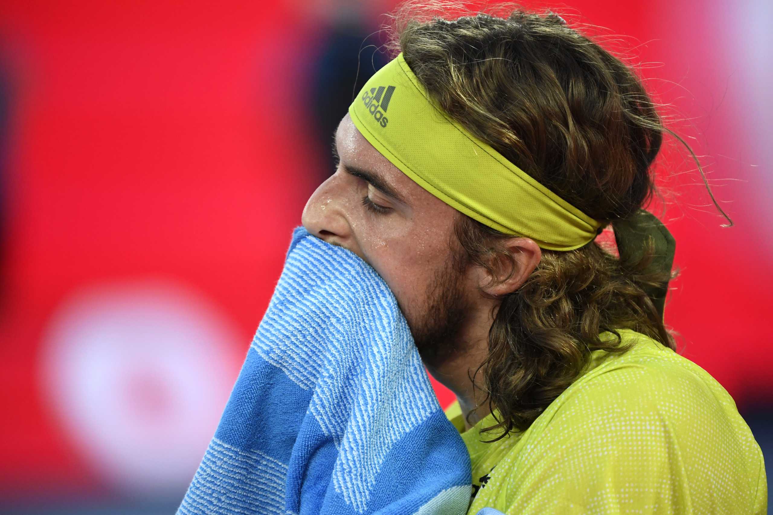 Tennis - Australian Open - Melbourne Park, Melbourne, Australia, February 19, 2021 Greece's Stefanos Tsitsipas reacts during his semi final match against Russia's Daniil Medvedev REUTERS
