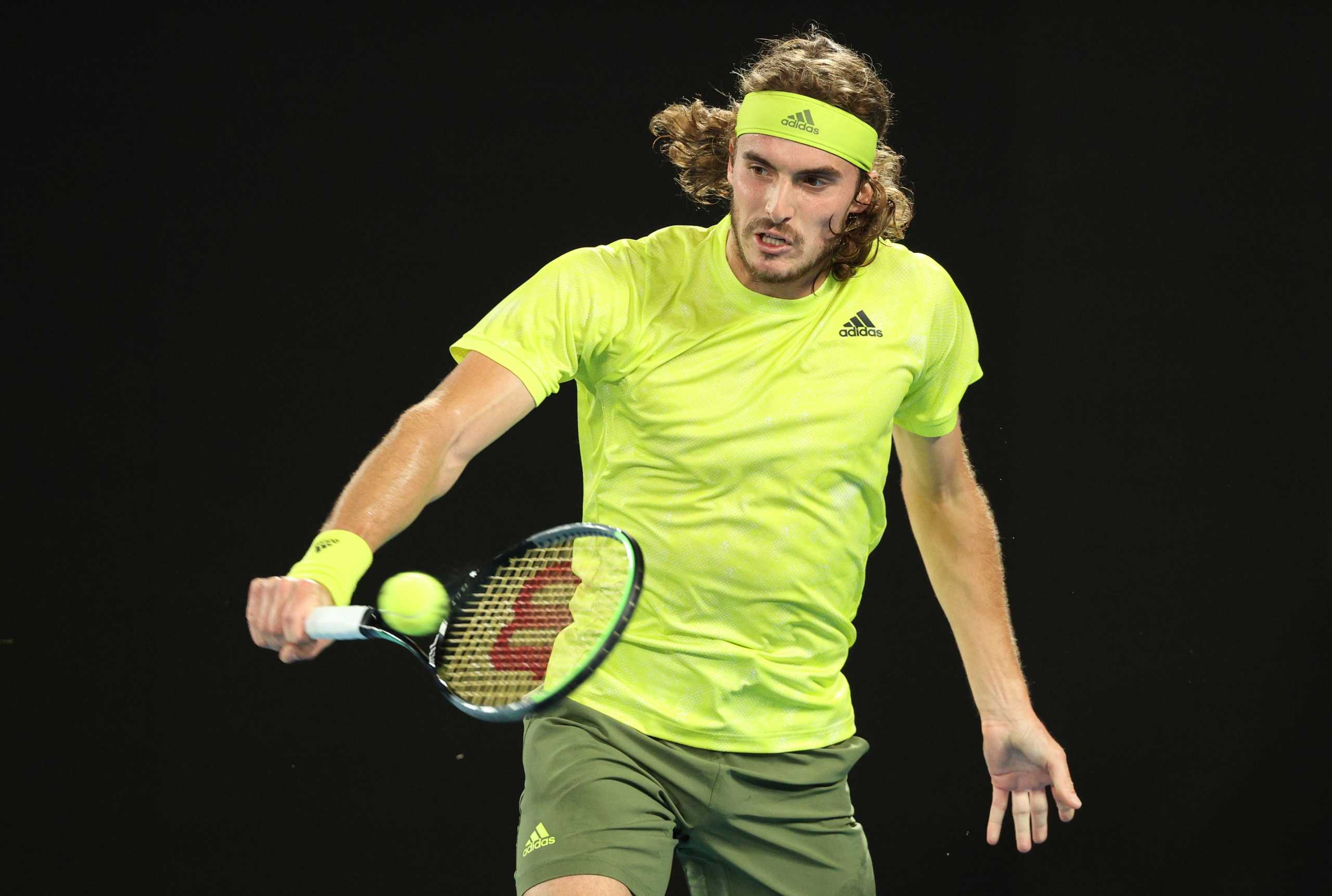 Tennis - Australian Open - Melbourne Park, Melbourne, Australia, February 9, 2021 Greece's Stefanos Tsitsipas in action during his first round match against France's Gilles Simon REUTERS