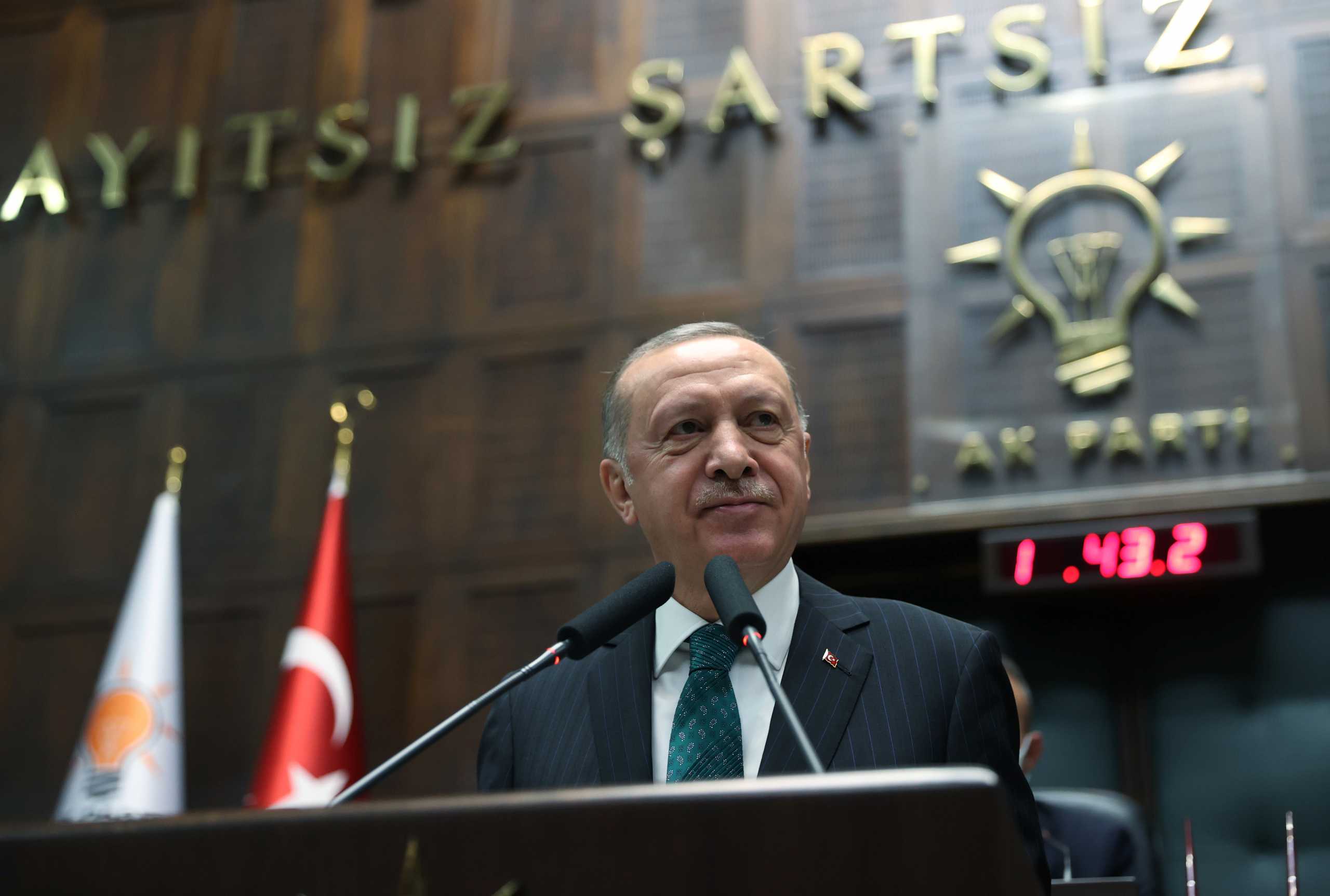 Turkish President Tayyip Erdogan addresses members of parliament from his ruling AK Party (AKP) during a meeting at the Turkish parliament in Ankara, Turkey, February 10, 2021. Murat Cetinmuhurdar
