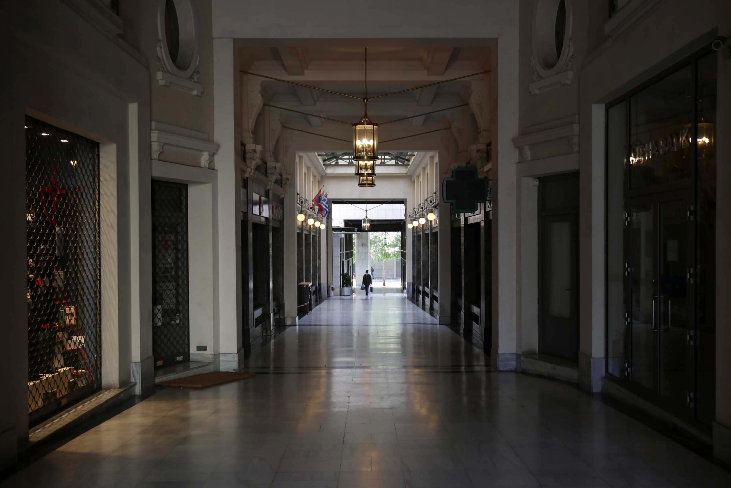 Closed shops are pictured at a shopping arcade, amid lockdown restrictions due to the spread of the coronavirus disease (COVID-19) pandemic, in Athens, Greece, February 6, 2021. REUTERS