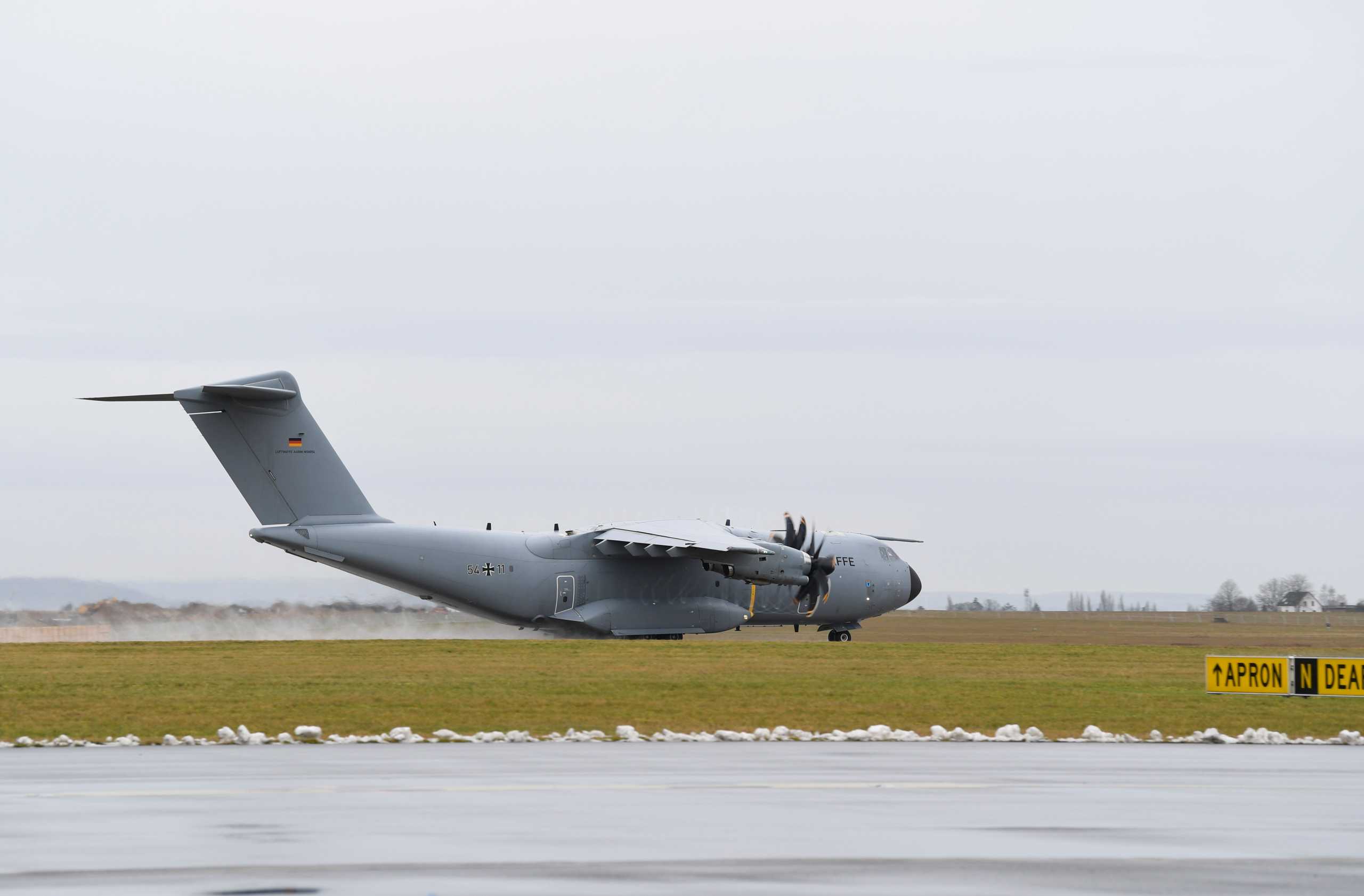 An A400M military transport plane carrying 26 doctors, nurses and hygiene experts as well as 40 mobile and 10 stationary ventilators takes off, in Wunstorf, Germany, February 3, 2021. REUTERS