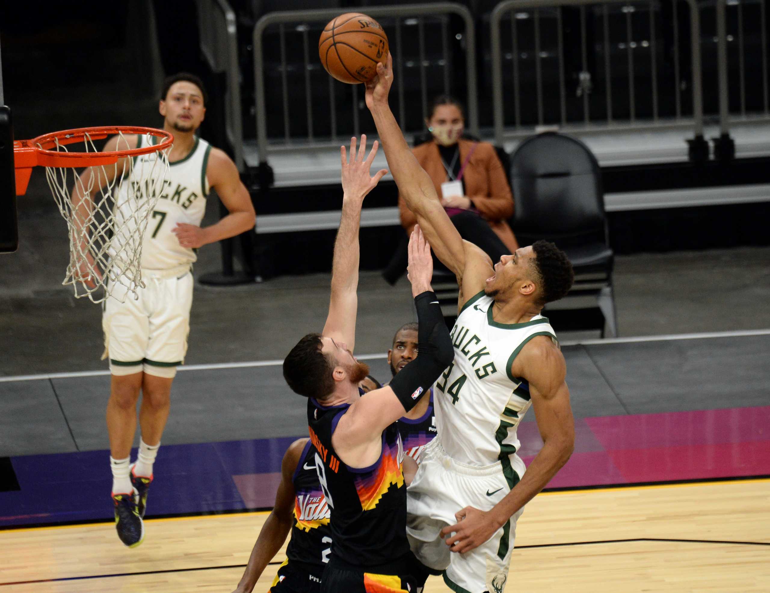 Feb 10, 2021; Phoenix, Arizona, USA; Milwaukee Bucks forward Giannis Antetokounmpo (34) attempts a dunk against Phoenix Suns forward Frank Kaminsky (8) during the second half at Phoenix Suns Arena. Mandatory Credit: Joe Camporeale-USA TODAY Sports