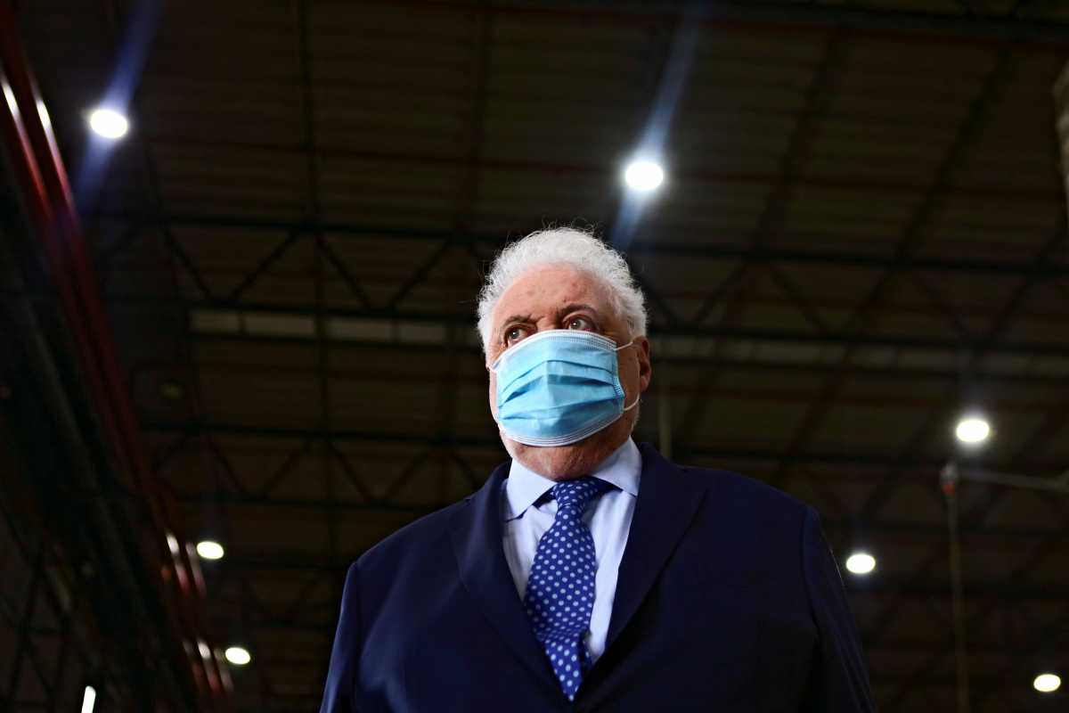 FILE PHOTO: Argentina's Health Minister Gines Gonzalez Garcia looks on during the arrival of 580,000 doses of the Oxford-AstraZeneca coronavirus disease (COVID-19) vaccine at Ezeiza International Airport in Buenos Aires, Argentina, February 17, 2021. REUTERS