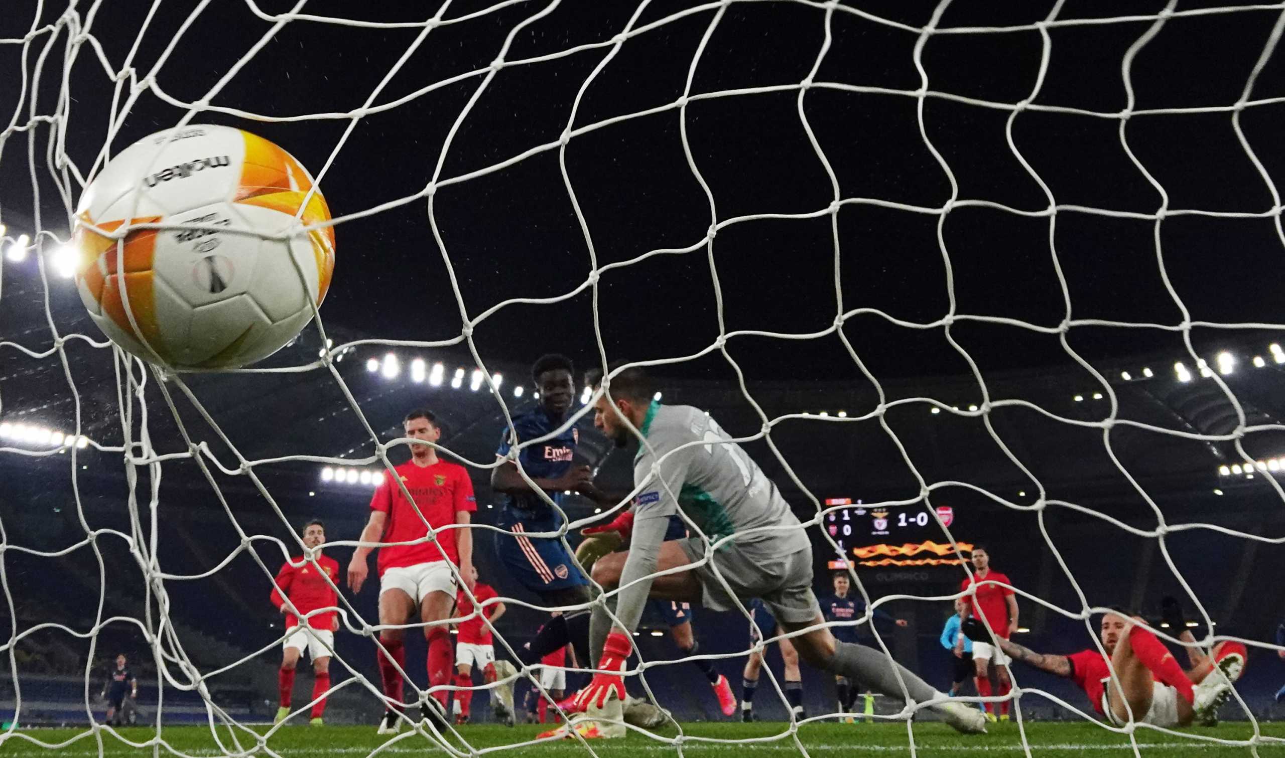 Soccer Football - Europa League - Round of 32 First Leg - Benfica v Arsenal - Stadio Olimpico, Rome, Italy - February 18, 2021 Arsenal's Bukayo Saka scores their first goal REUTERS