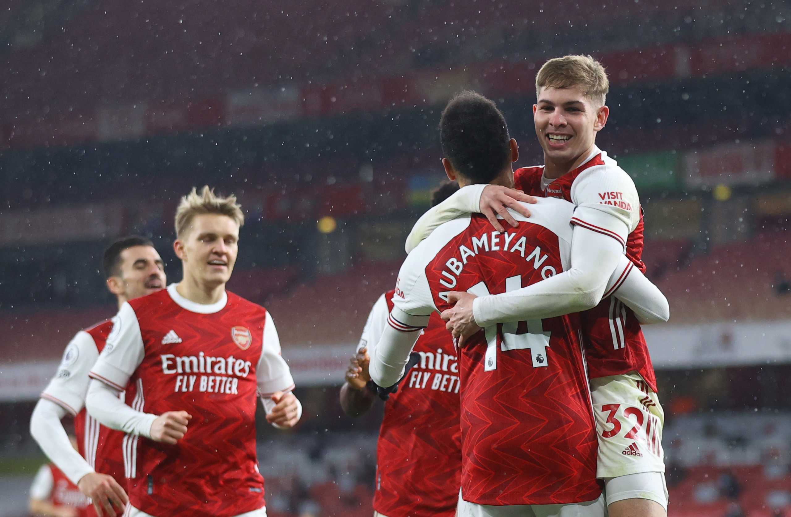 Soccer Football - Premier League - Arsenal v Leeds United - Emirates Stadium, London, Britain - February 14, 2021 Arsenal's Pierre-Emerick Aubameyang celebrates scoring their fourth goal with teammate Emile Smith Rowe Pool via REUTERS
