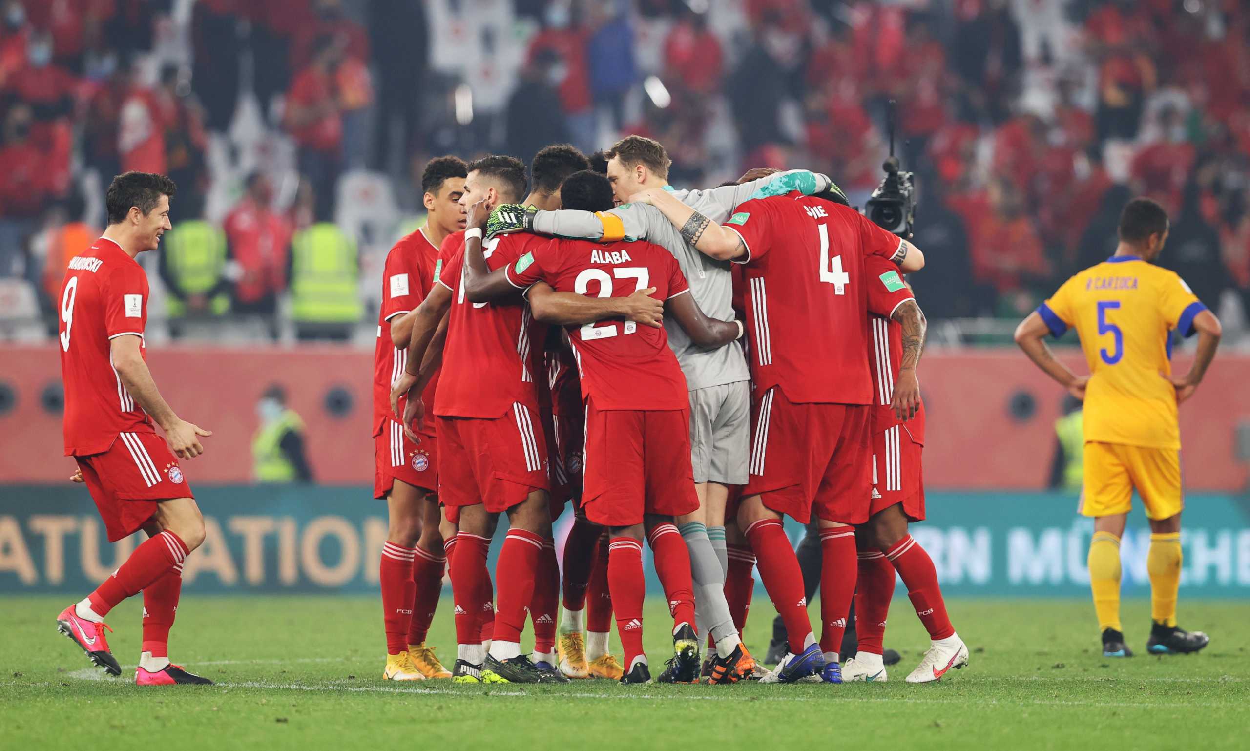 Soccer Football - Club World Cup - Final - Bayern Munich v Tigres UANL - Education City Stadium, Al Rayyan, Qatar - February 11, 2021 Bayern Munich players celebrate after the match REUTERS