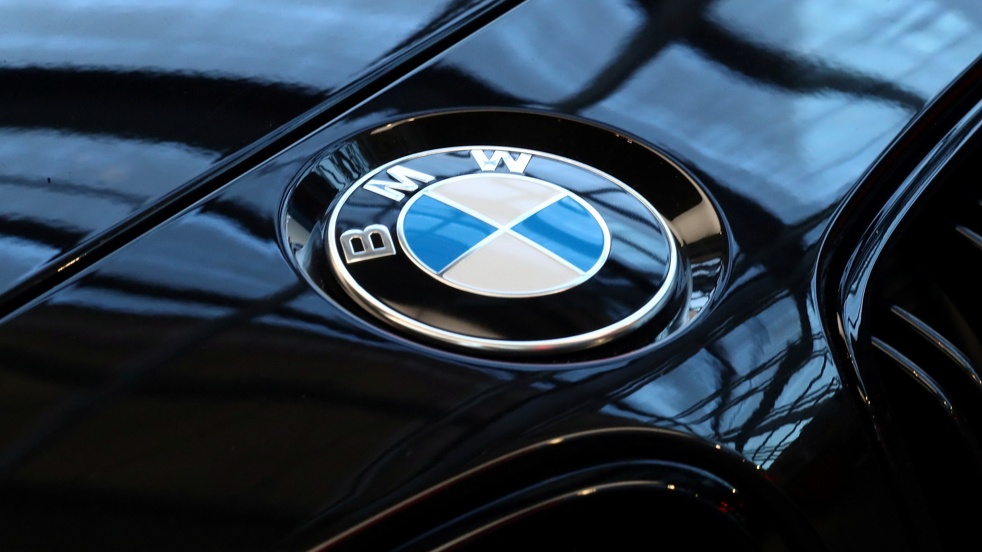 FILE PHOTO: A logo of German luxury carmaker BMW, is seen ahead of the company's annual news conference in Munich, Germany, March 20, 2019. REUTERS