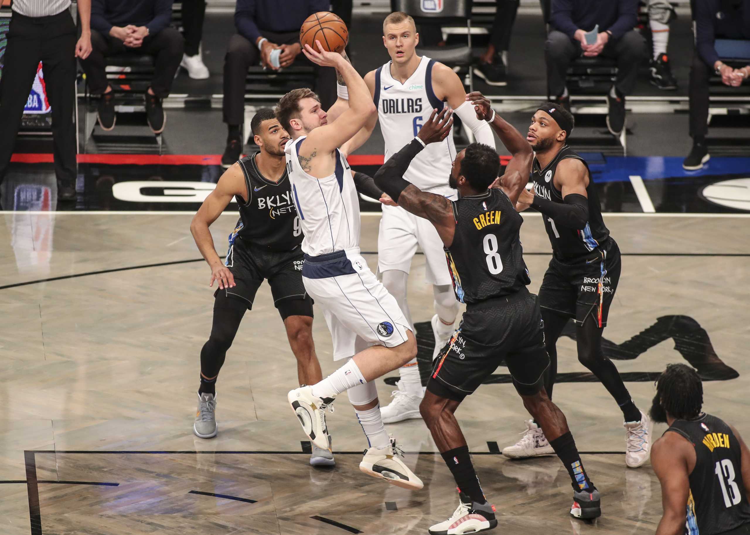 Feb 27, 2021; Brooklyn, New York, USA;  Dallas Mavericks guard Luka Doncic (77) puts up a jump shot in the first quarter against the Brooklyn Nets at Barclays Center. Mandatory Credit: Wendell Cruz-USA TODAY Sports