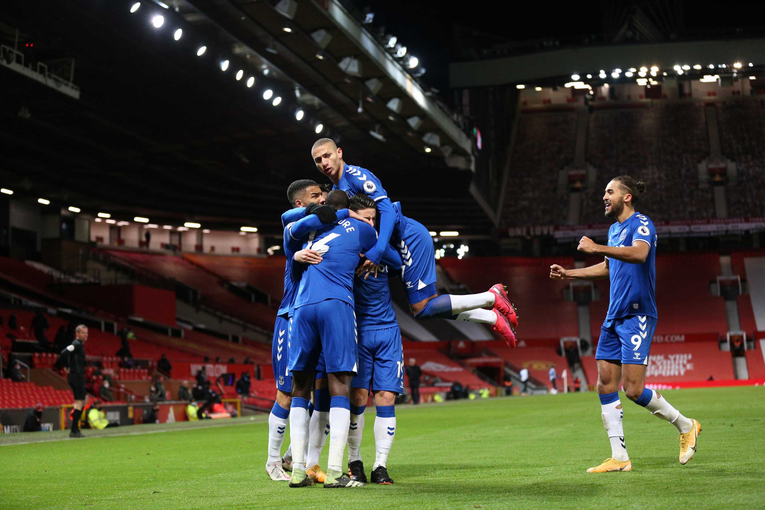 Soccer Football - Premier League - Manchester United v Everton - Old Trafford, Manchester, Britain - February 6, 2021 Everton's James Rodriguez celebrates scoring their second goal with teammates Pool via REUTERS