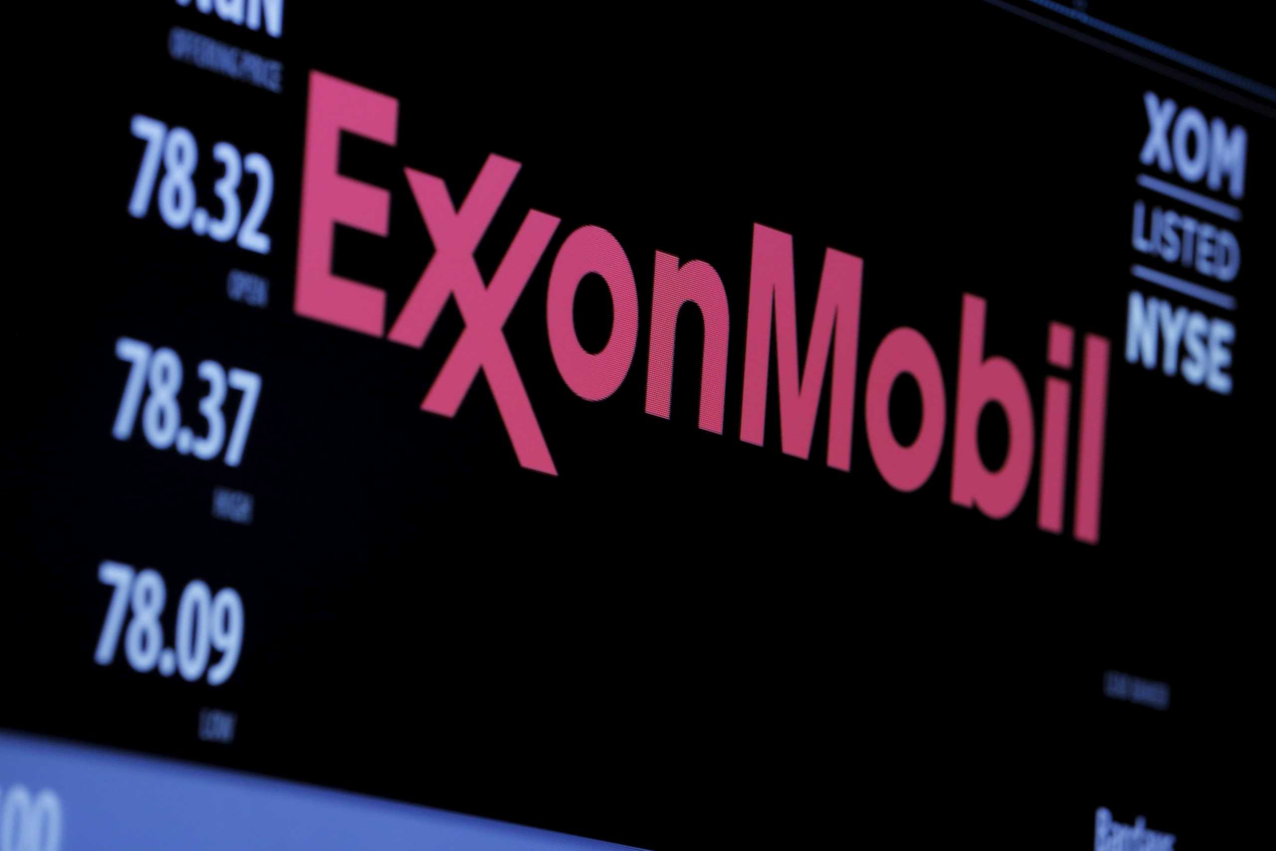 FILE PHOTO: The logo of Exxon Mobil Corporation is shown on a monitor above the floor of the New York Stock Exchange in New York, December 30, 2015.