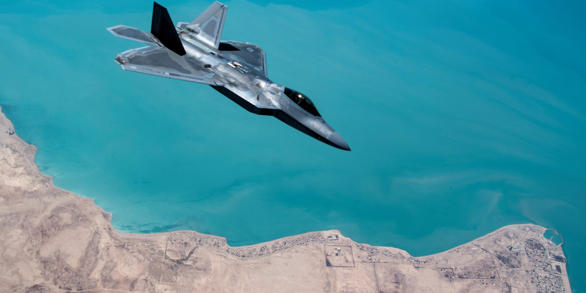 A U.S. F-22 Raptor, based out of Al Udeid Base in Doha, Qatar, receives fuel from a 28th Expeditionary Air Refuelling Squadron KC-135 Stratotanker during a combat air patrol mission over an undisclosed location in Southwest Asia, in this picture taken September 13, 2019 and released by U.S Air Force on September 18, 2019. Russ Scalf