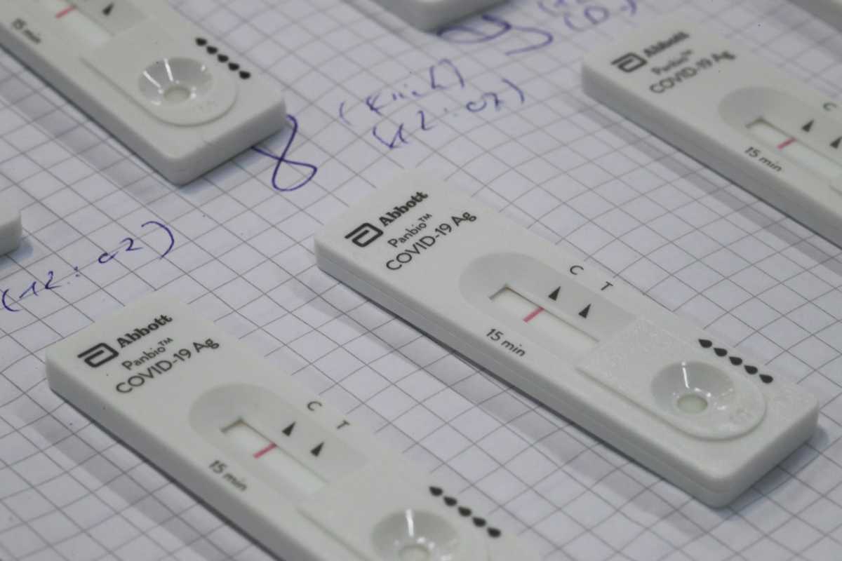 Negative COVID-19 quick tests are pictured at a vaccination centre temporarily set up in a hall of the fair of Cologne, Germany, February 8, 2021. REUTERS