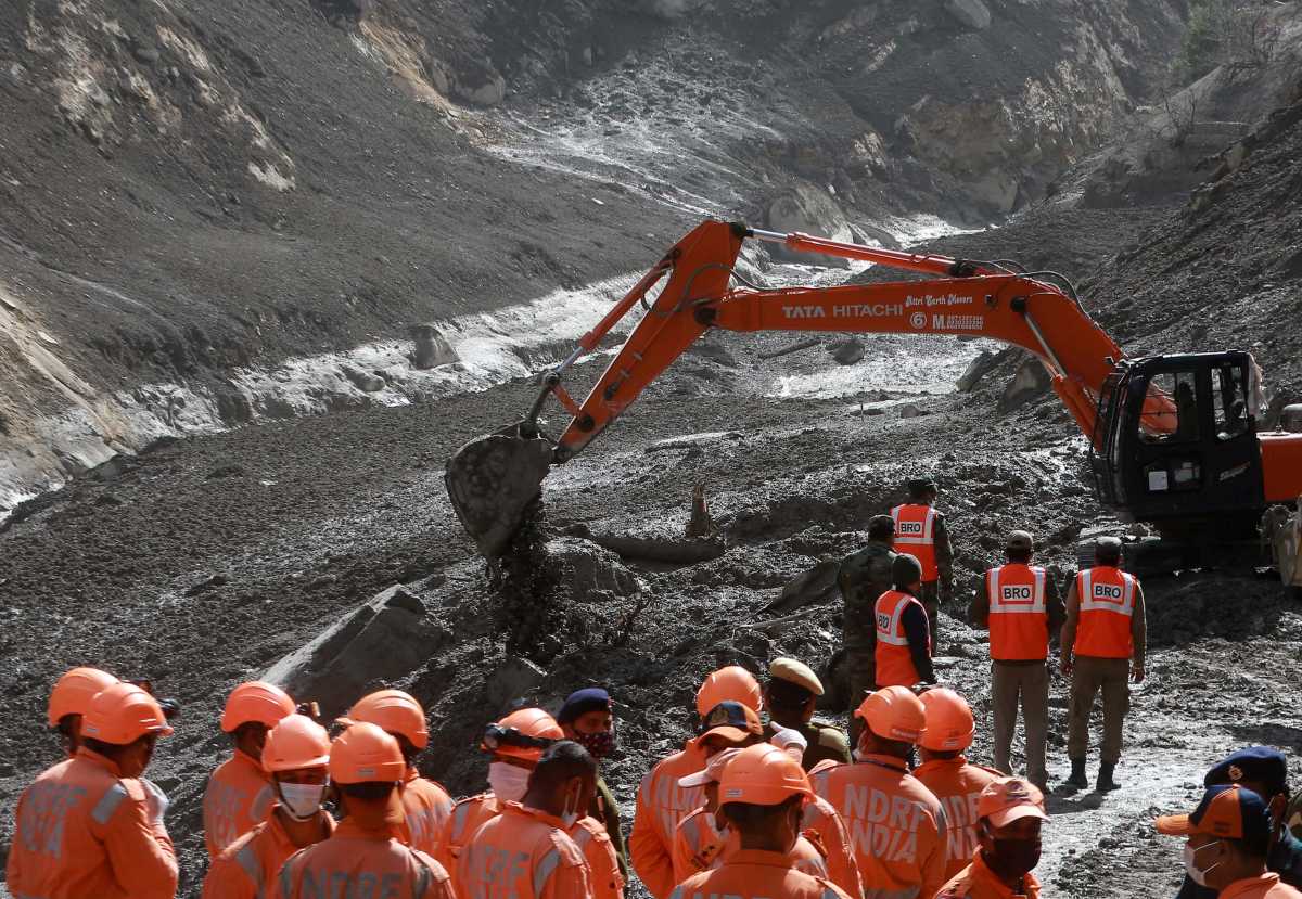 Members of the National Disaster Response Force (NDRF) conduct a rescue operation outside a tunnel after a part of a glacier broke away, in Tapovan in the northern state of Uttarakhand, India, February 9, 2021. REUTERS