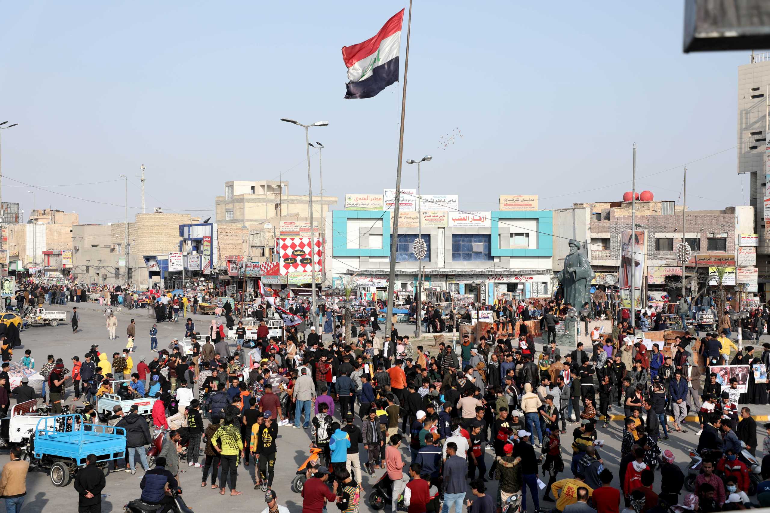 Iraqi demonstrators take part in ongoing anti-government protests in Nassiriya, Iraq January 29, 2021. Picture taken January 29, 2021 REUTERS