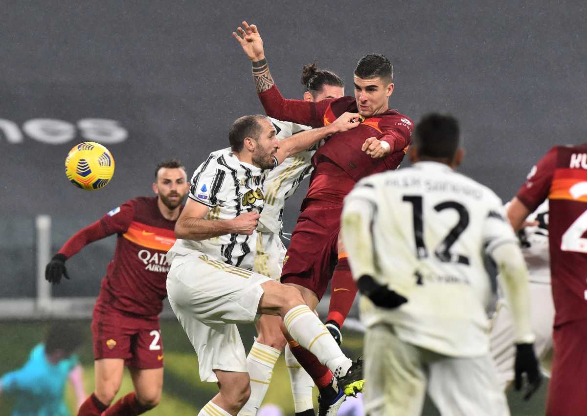 Soccer Football - Serie A - Juventus v AS Roma - Allianz Stadium, Turin, Italy - February 6, 2021 Juventus' Giorgio Chiellini in action with AS Roma's Gianluca Mancini REUTERS