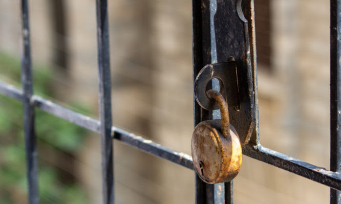 Iron grill in apartment balcony locked out for safety purpose.