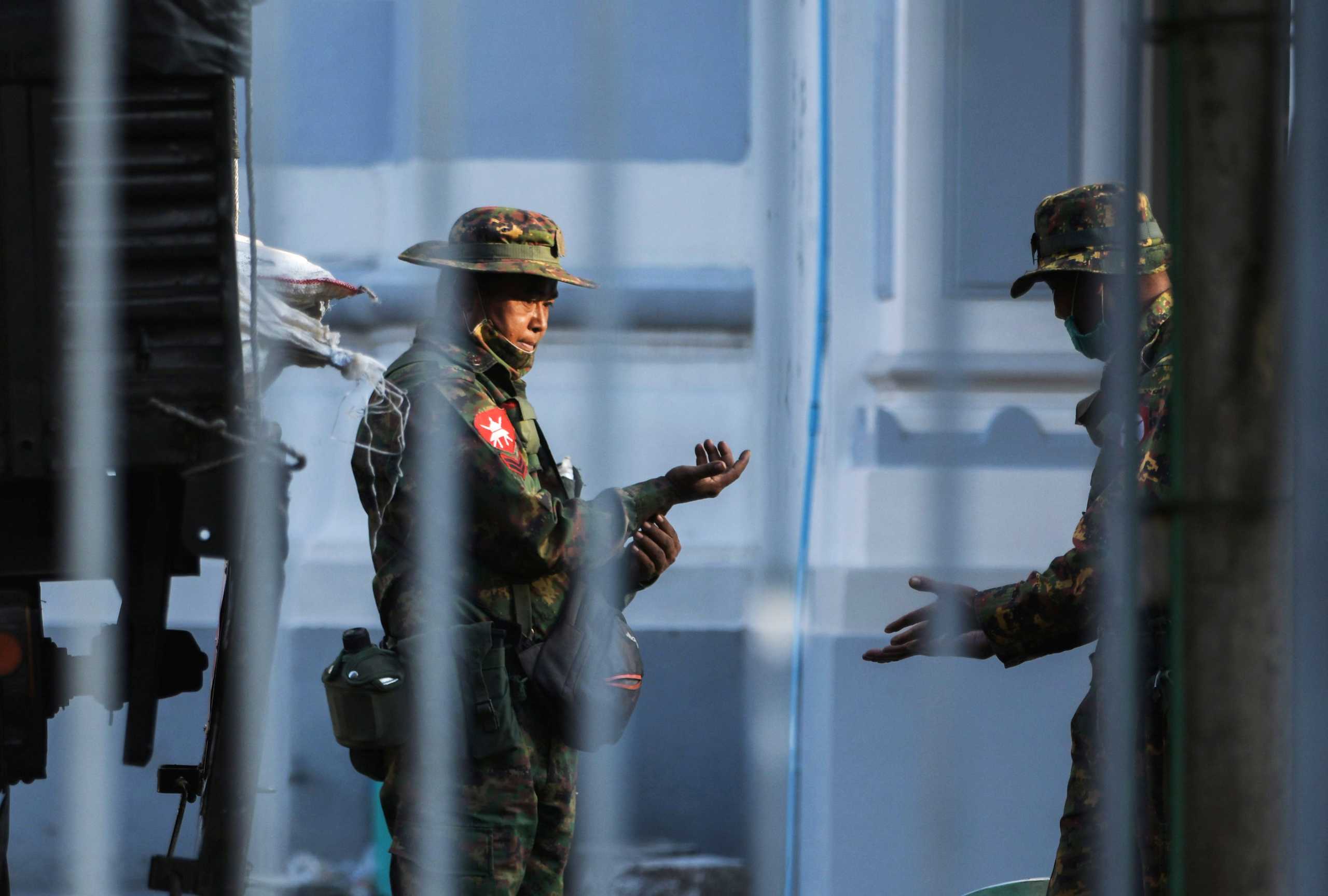 Myanmar soldiers are seen inside City Hall in Yangon, Myanmar February 1, 2021. REUTERS